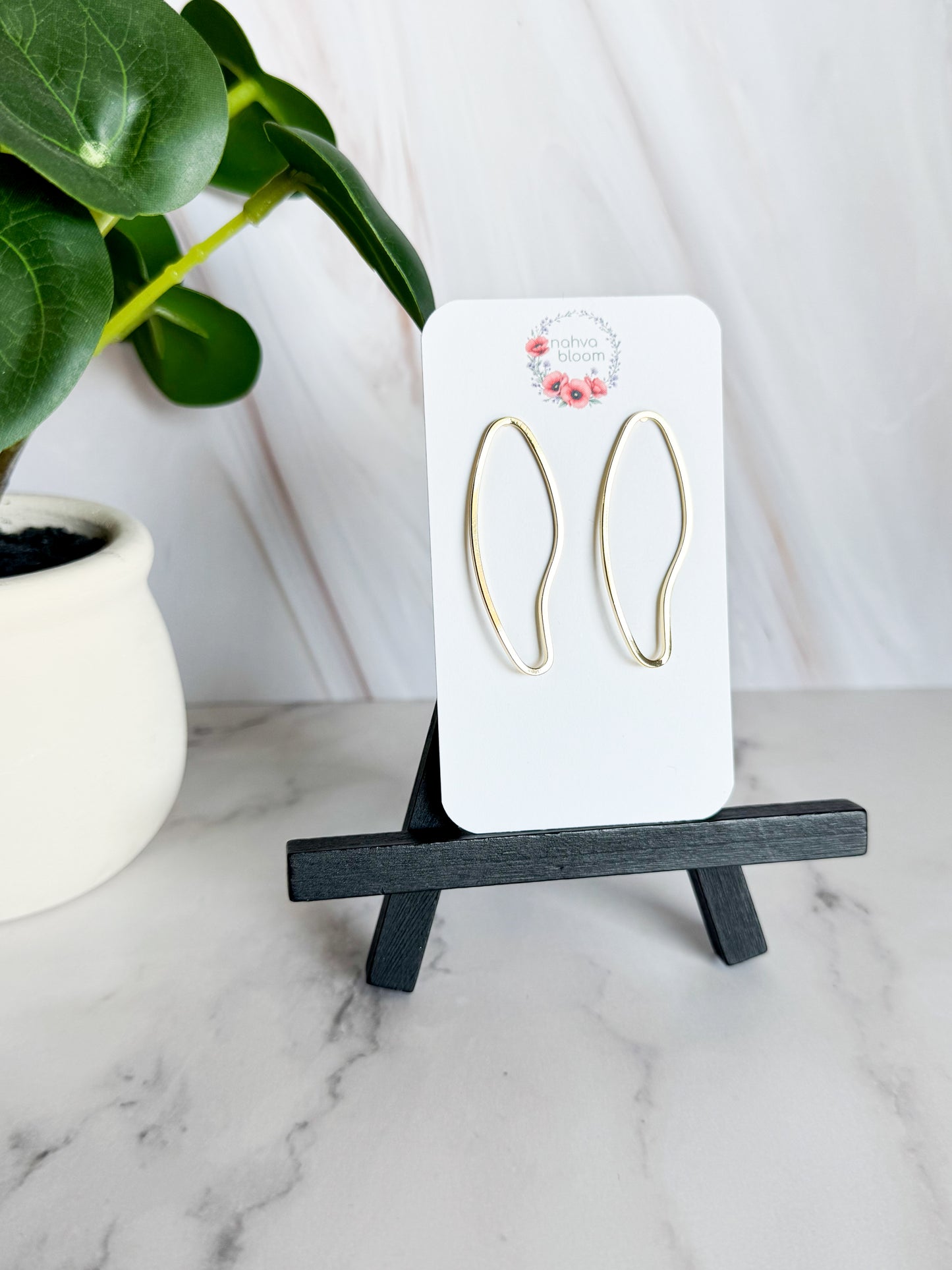 oversized irregular shaped studs in gold