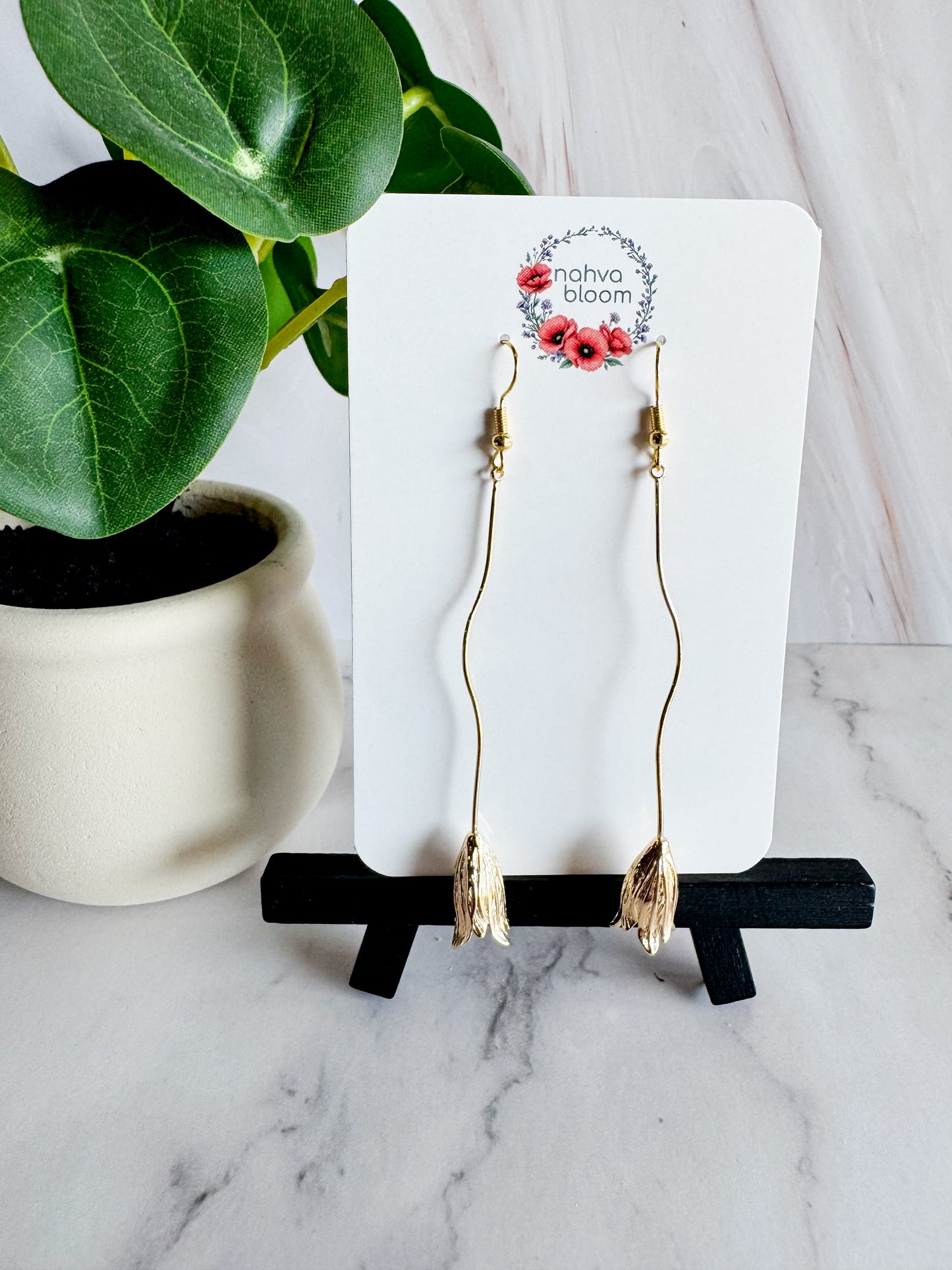 long flower earrings in gold