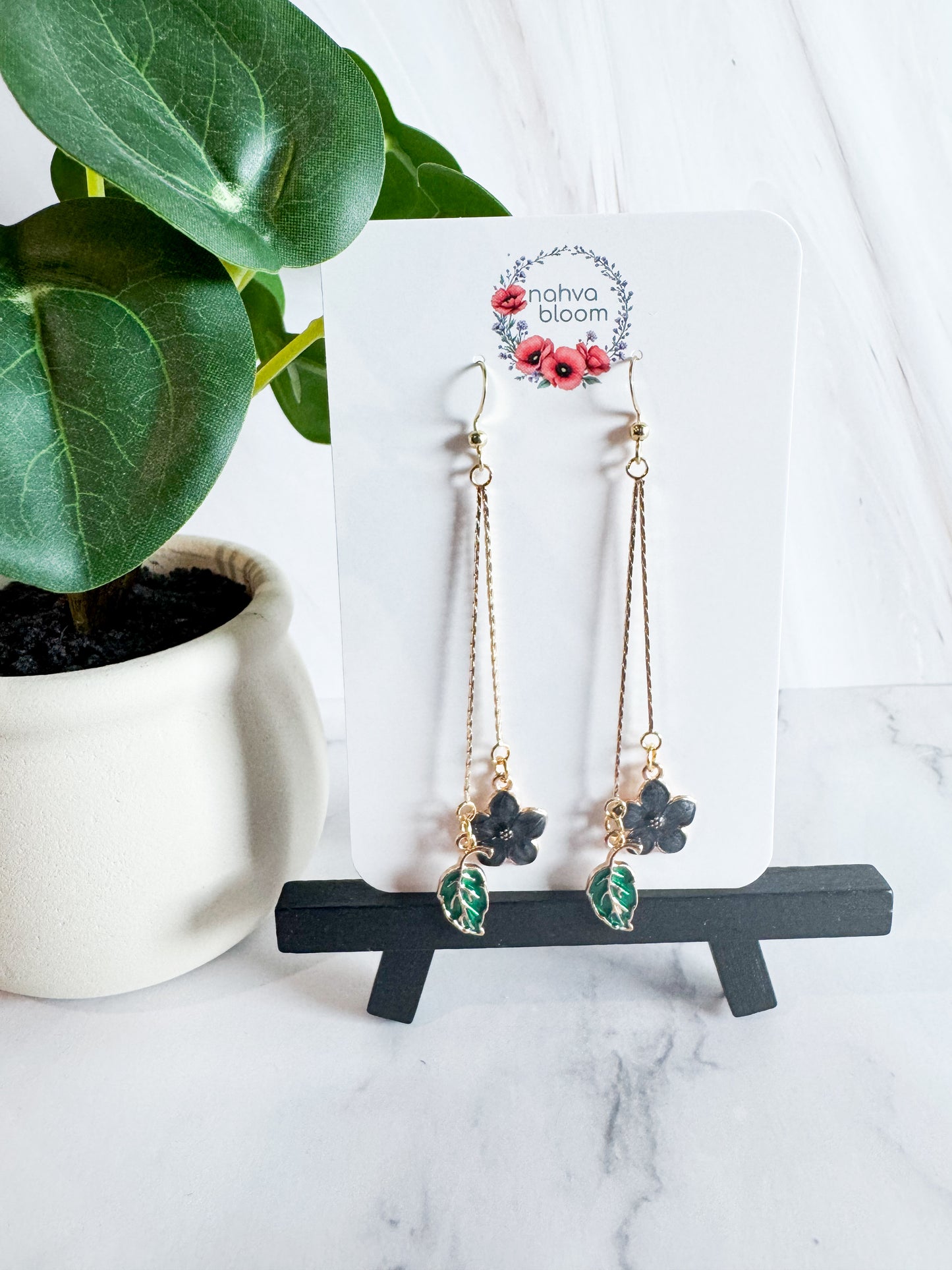 black flower & green leaf earrings
