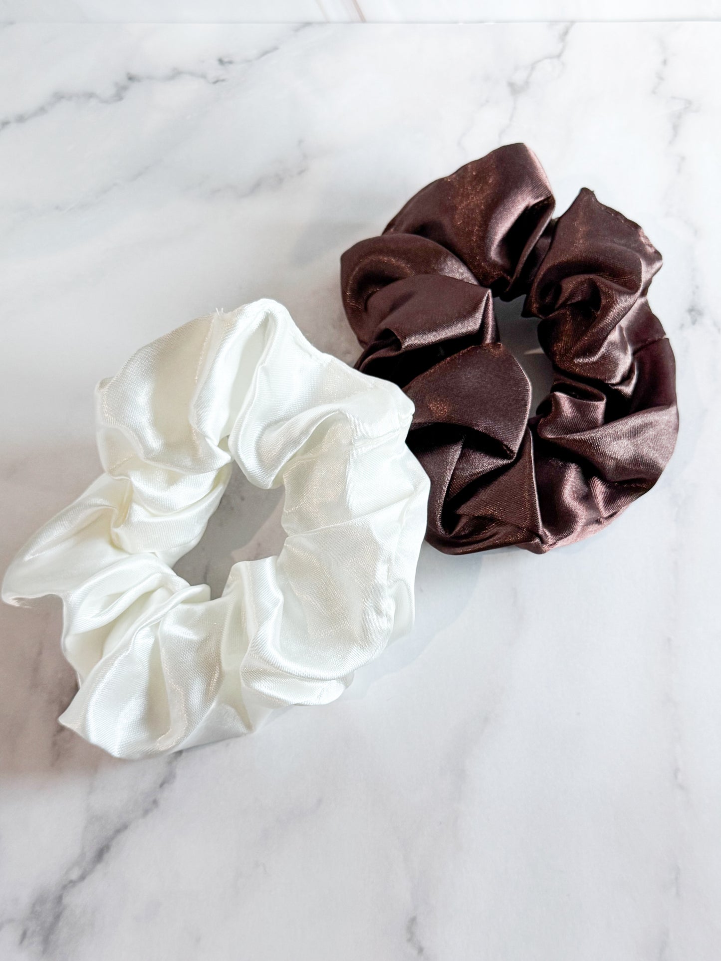 hair scrunchies in white and brown