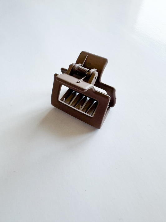 small rectangular hair claw in dark brown