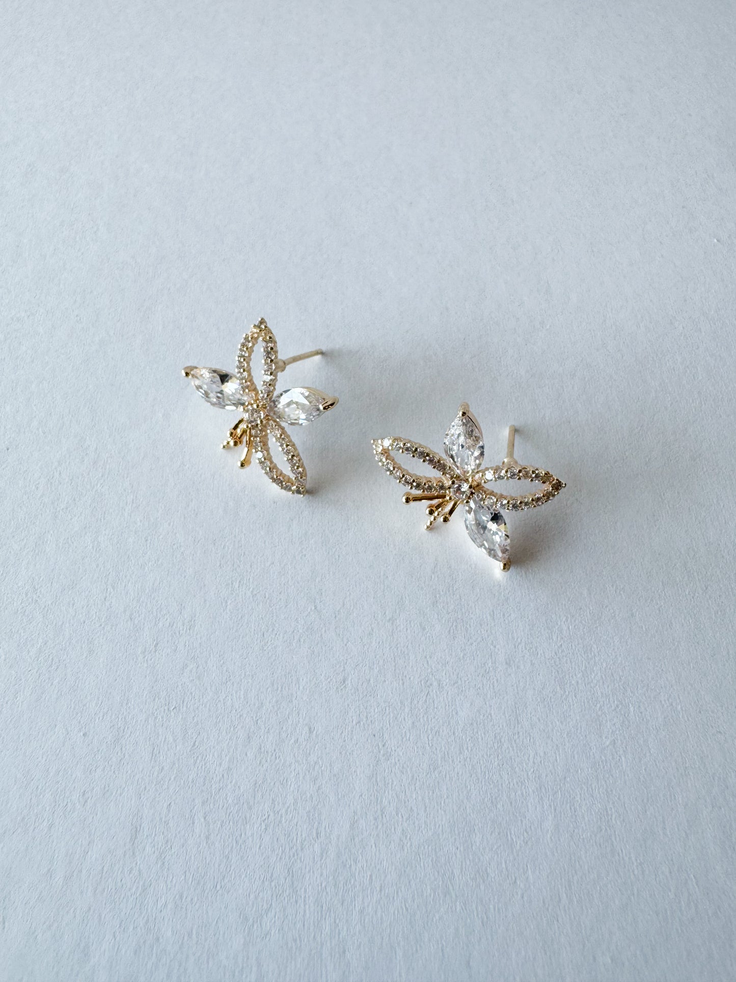 cz pave flower earrings in gold