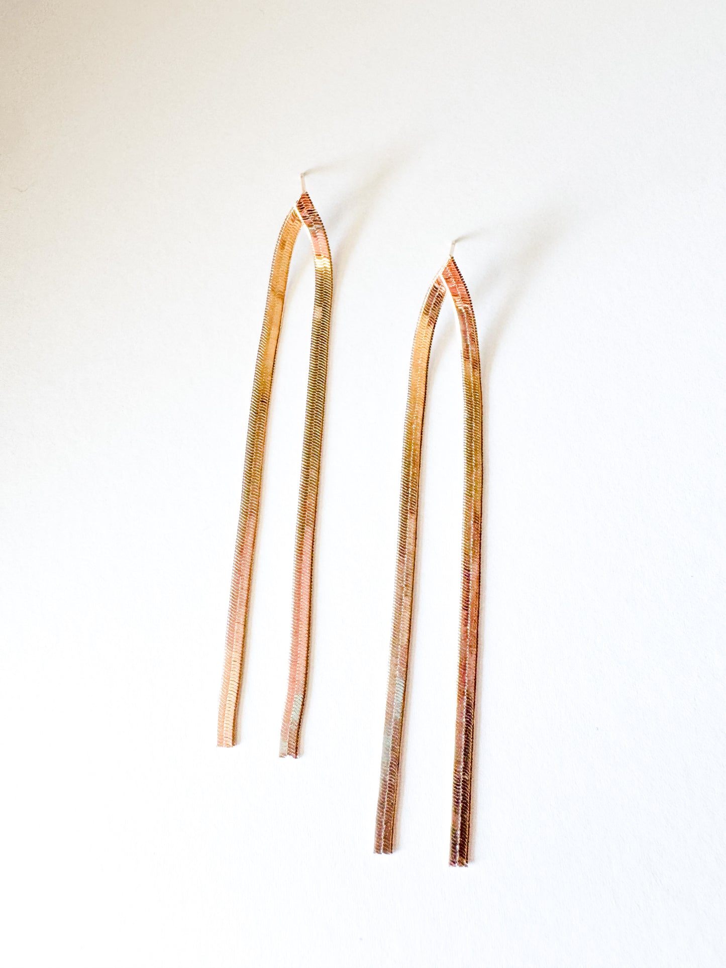 snake chain tassel earrings in gold