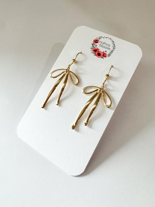 bow earrings in gold