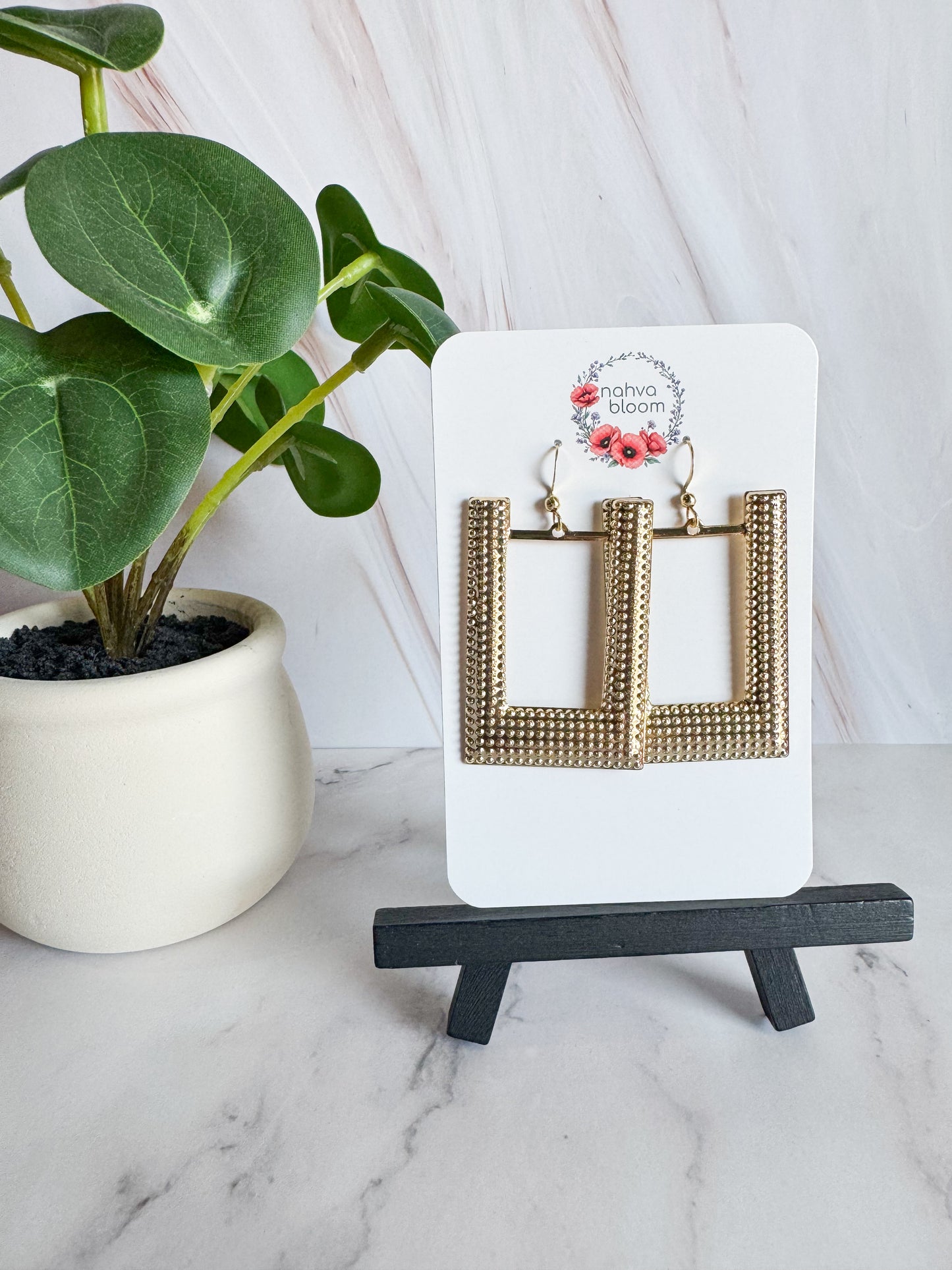 large u-shaped earrings in gold