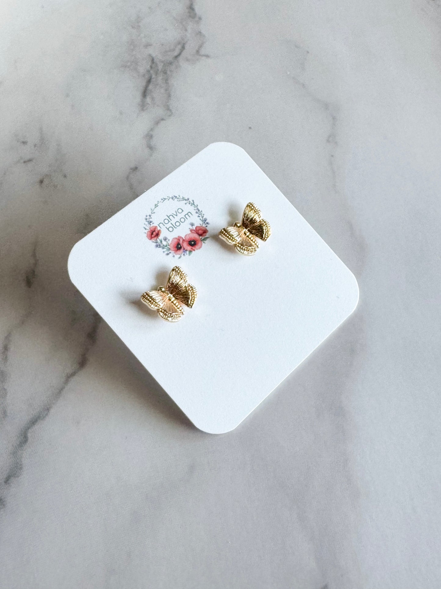 butterfly studs in gold