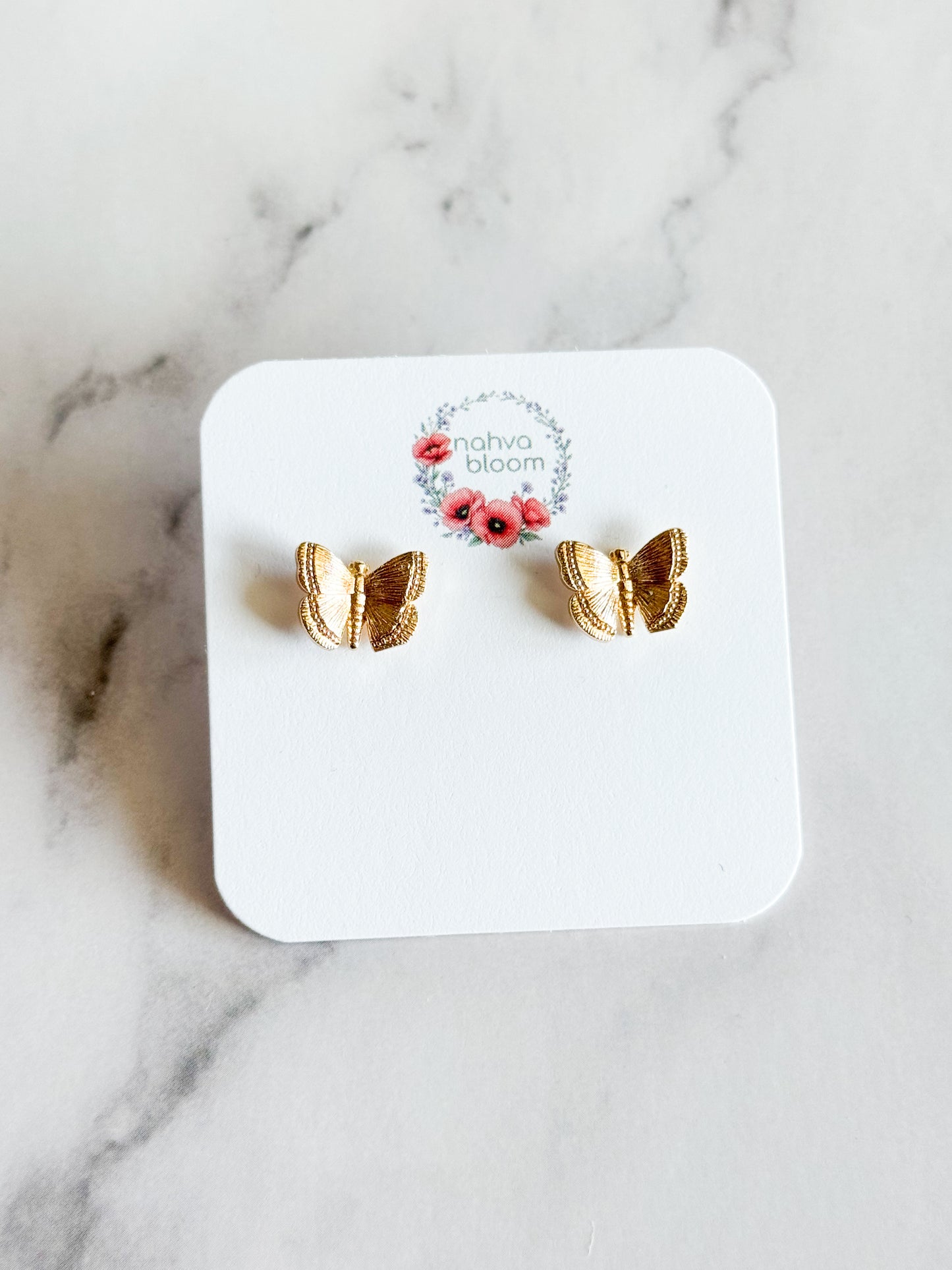butterfly studs in gold