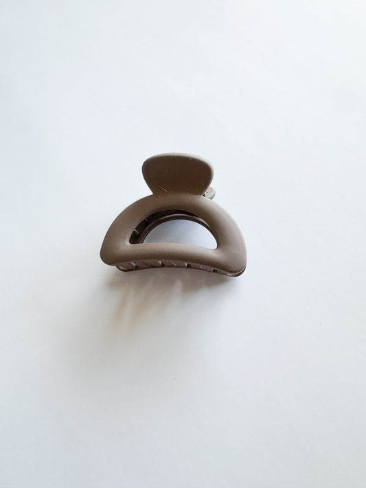 small semicircle hair claw in dark brown
