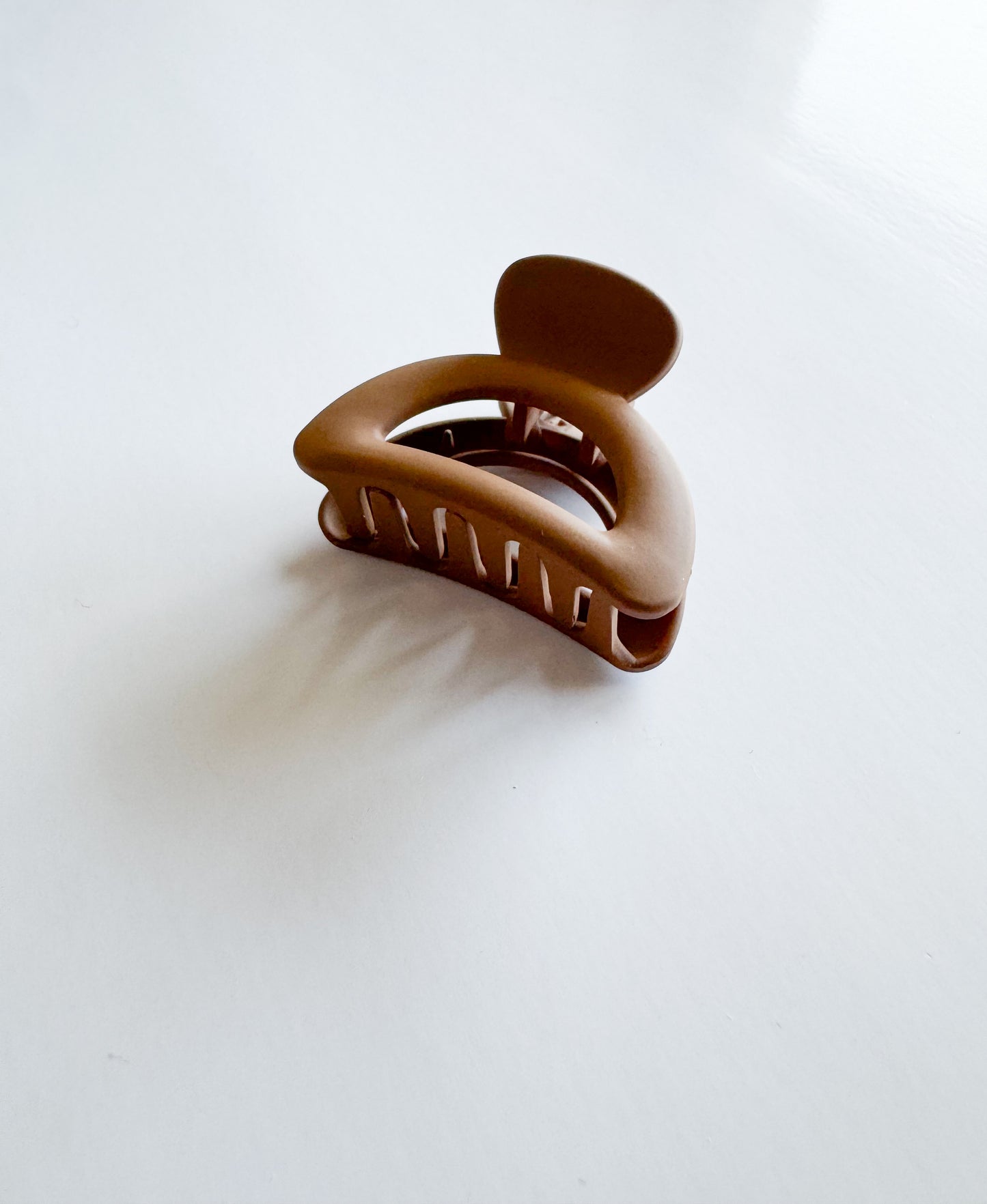 small semicircle hair claw in brown
