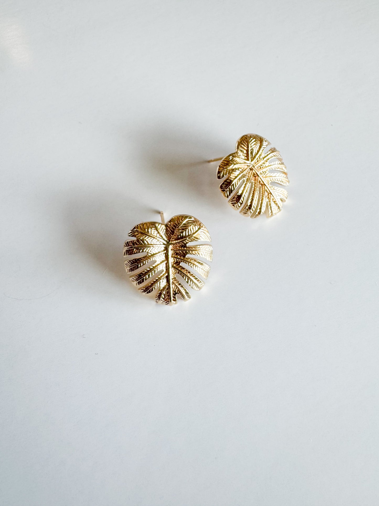 monstera leaf studs in gold