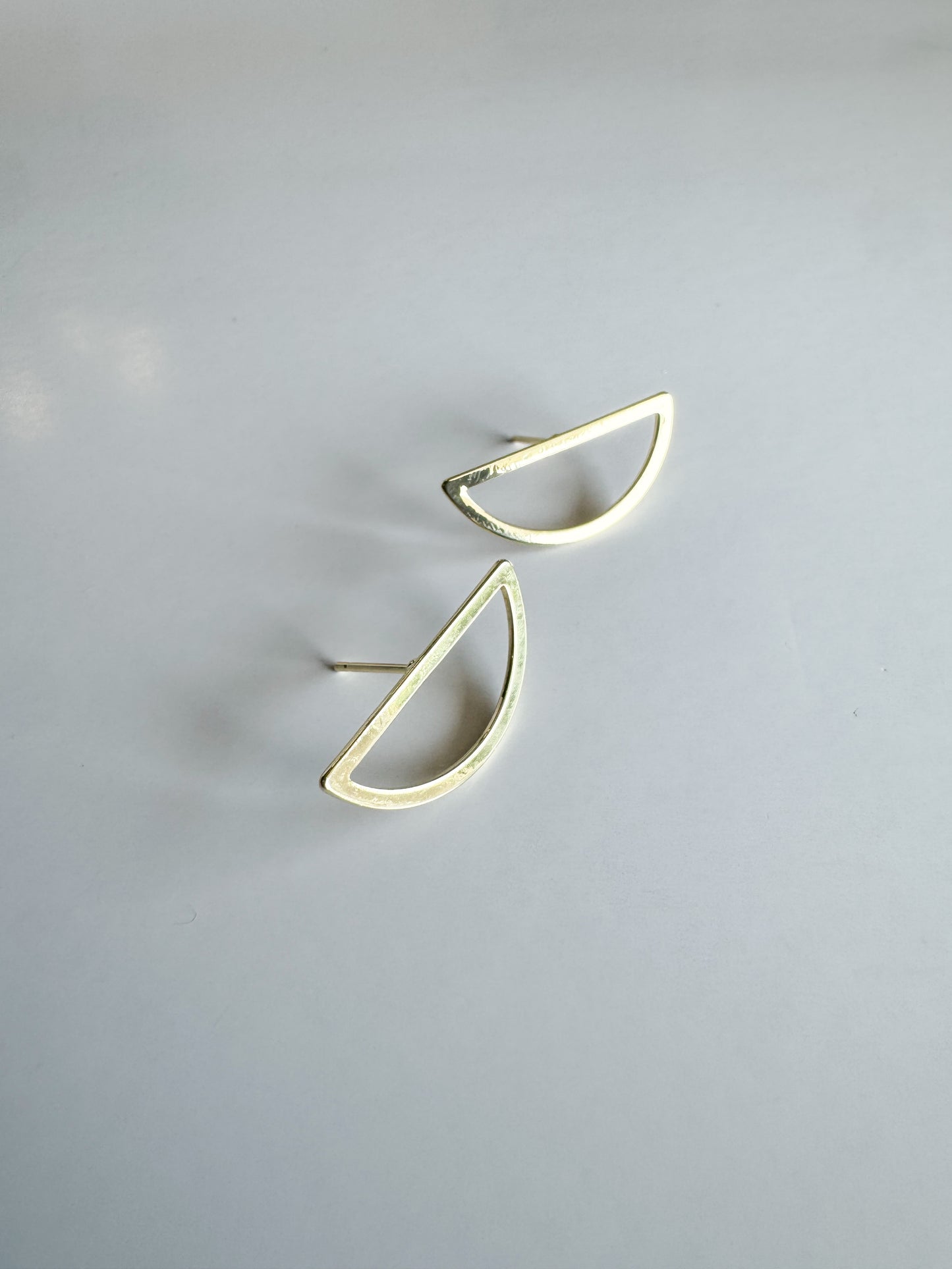 half circle studs in gold