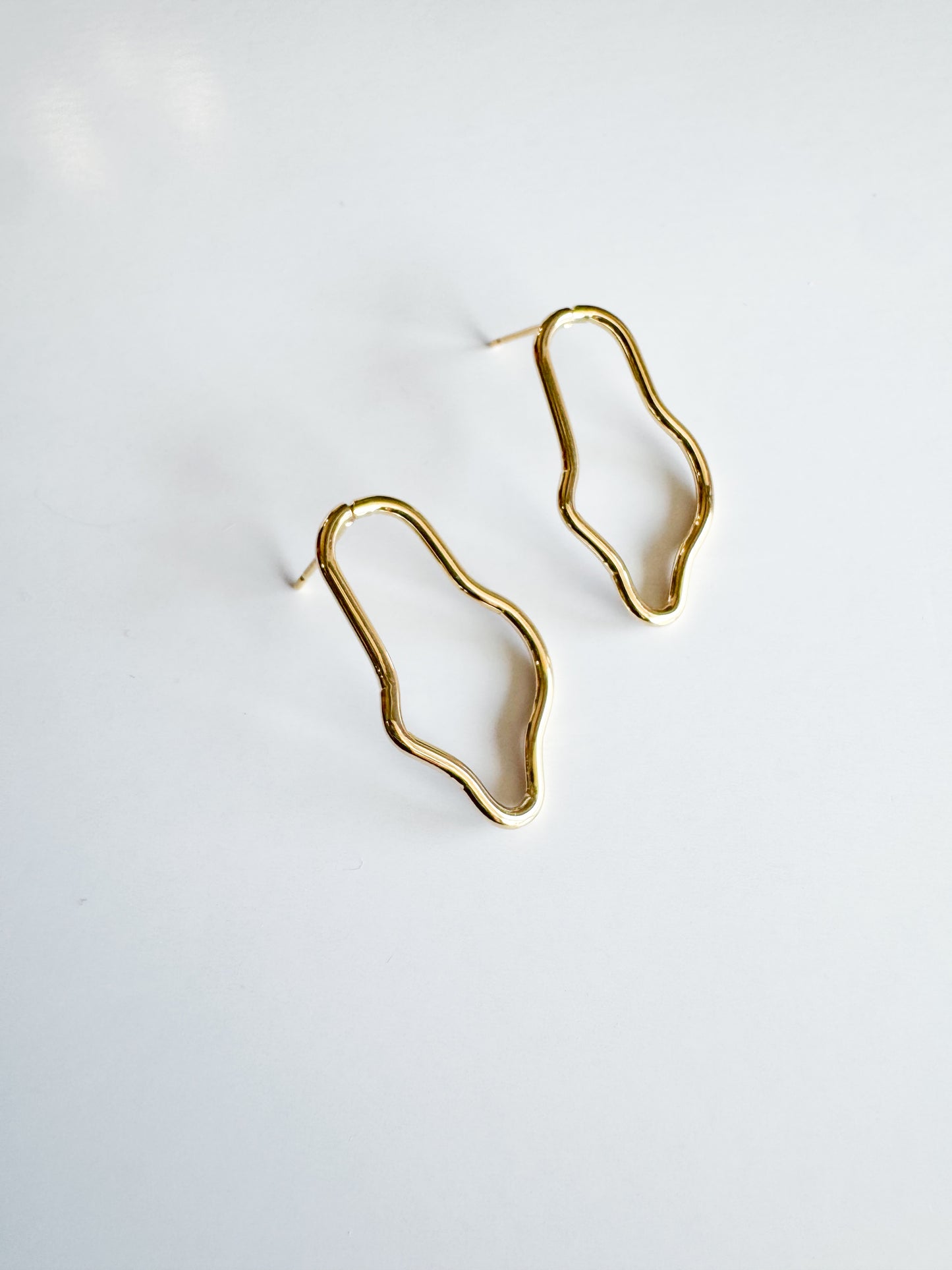 irregular shaped studs in gold
