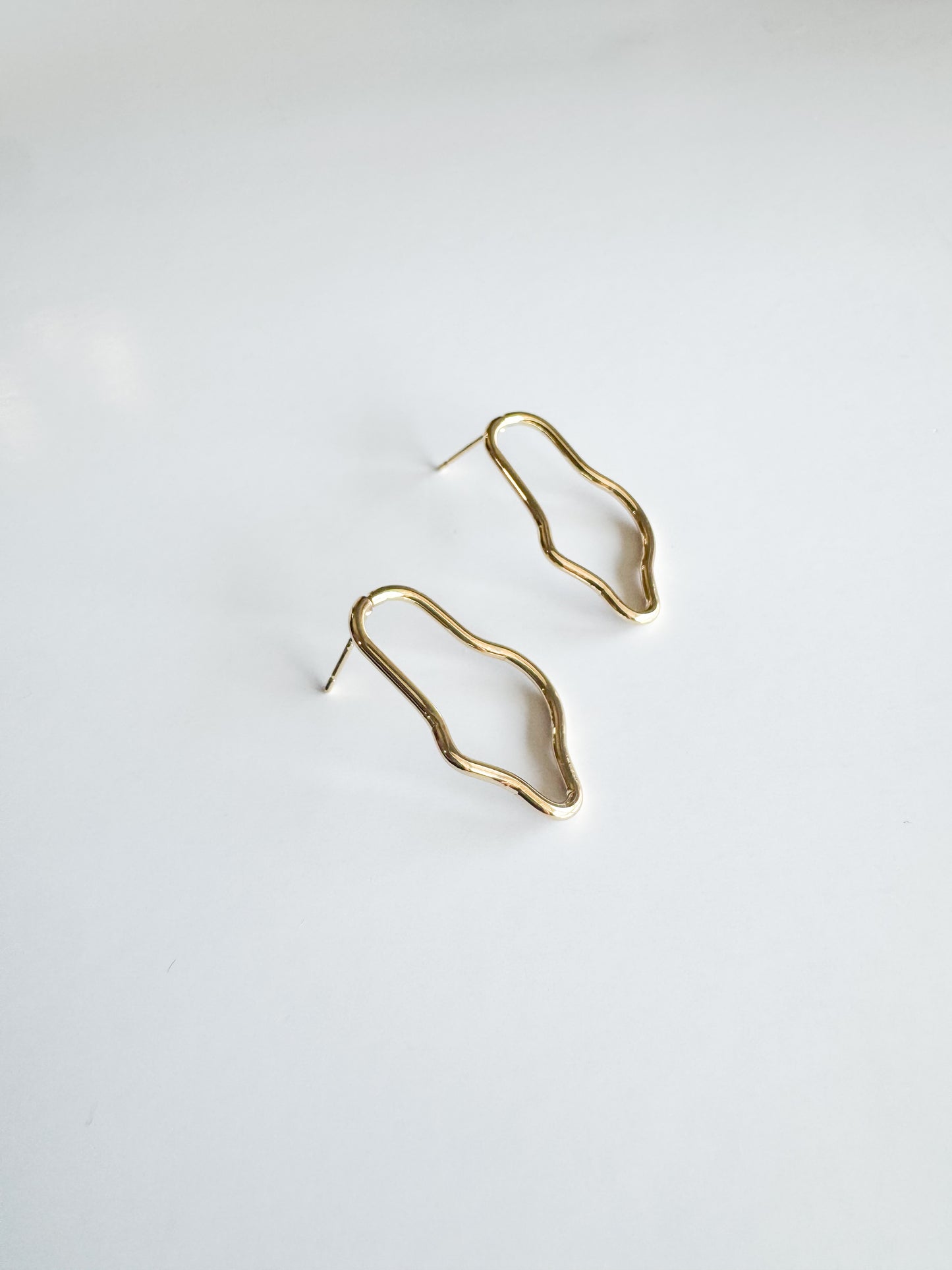 irregular shaped studs in gold