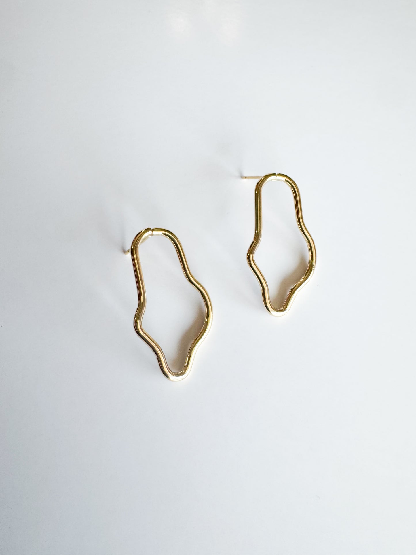 irregular shaped studs in gold