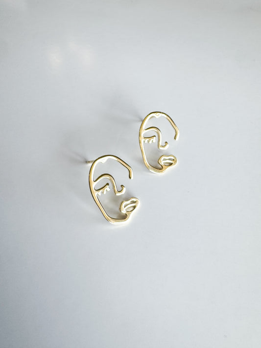 face studs in gold