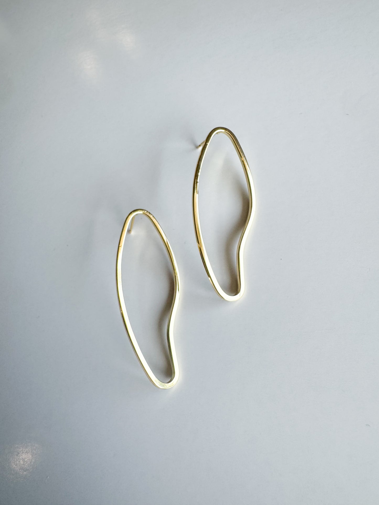 oversized irregular shaped studs in gold