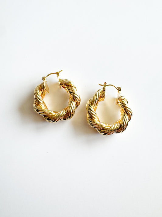 twisted hoop earrings in gold