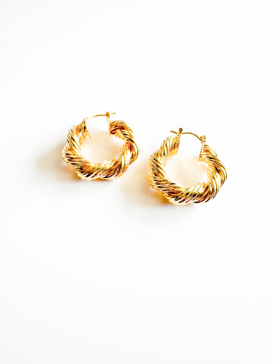 twisted hoop earrings in gold