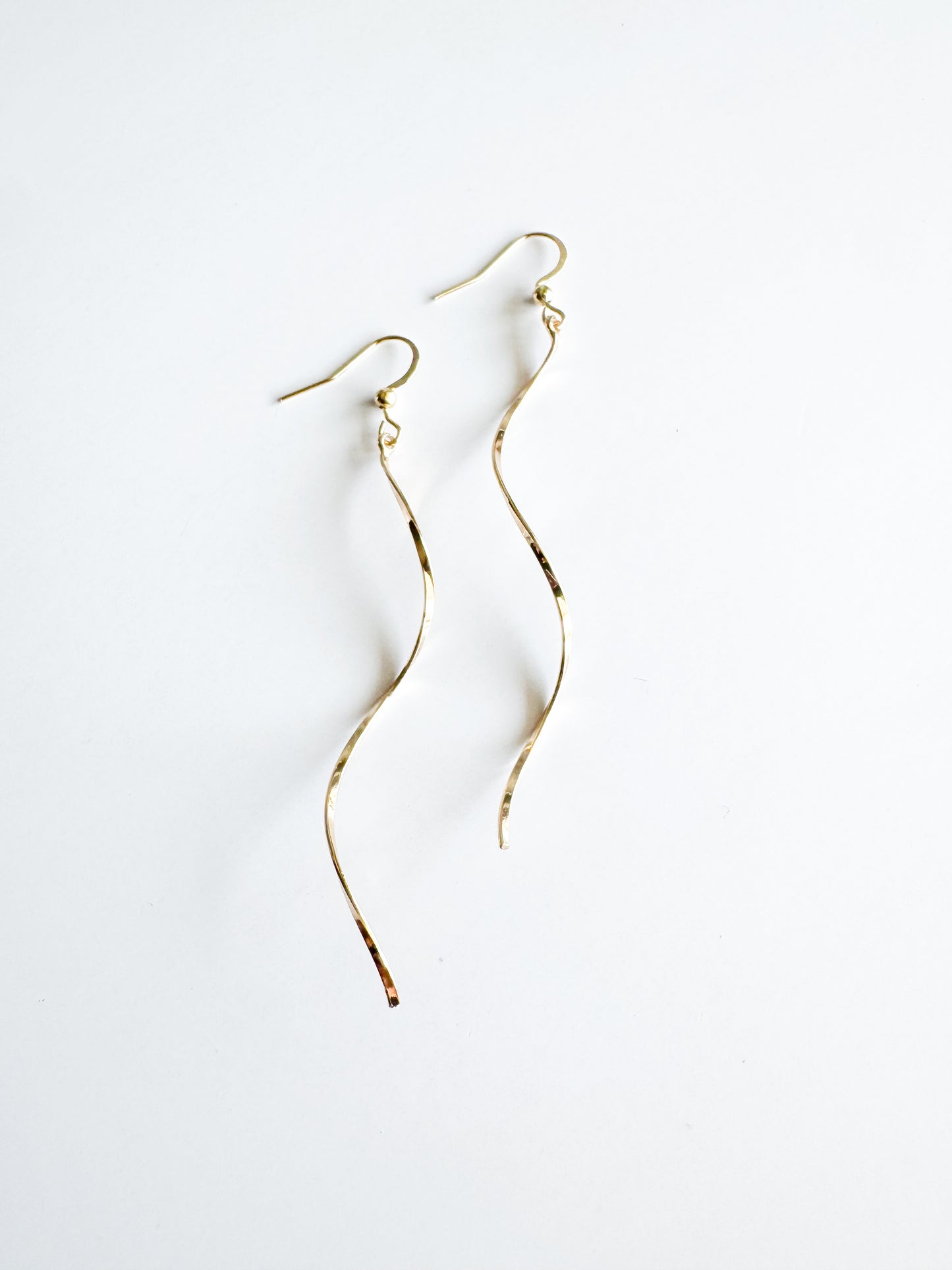 wavy bar earrings in gold