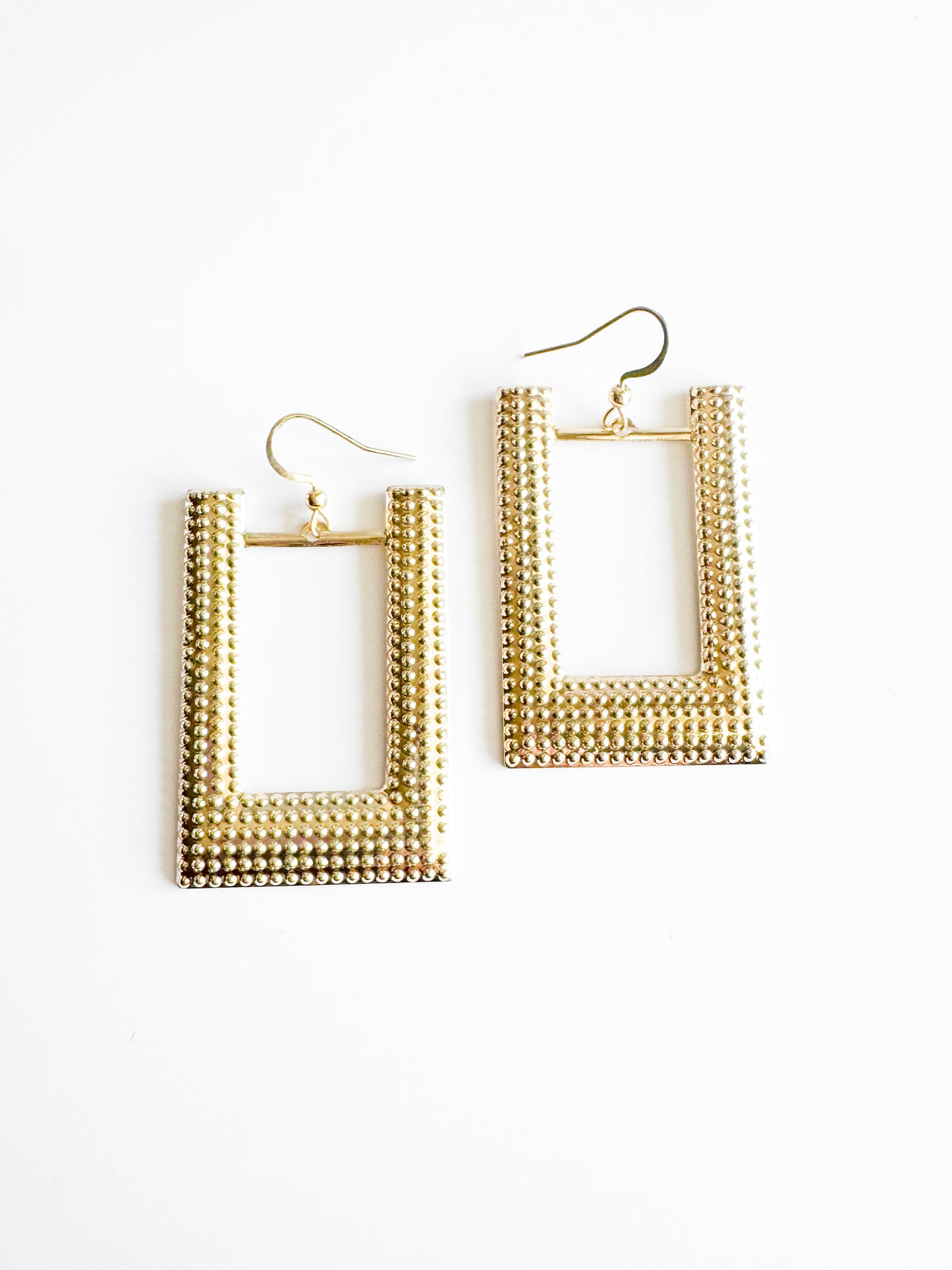 large u-shaped earrings in gold
