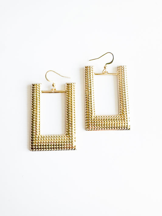large u-shaped earrings in gold