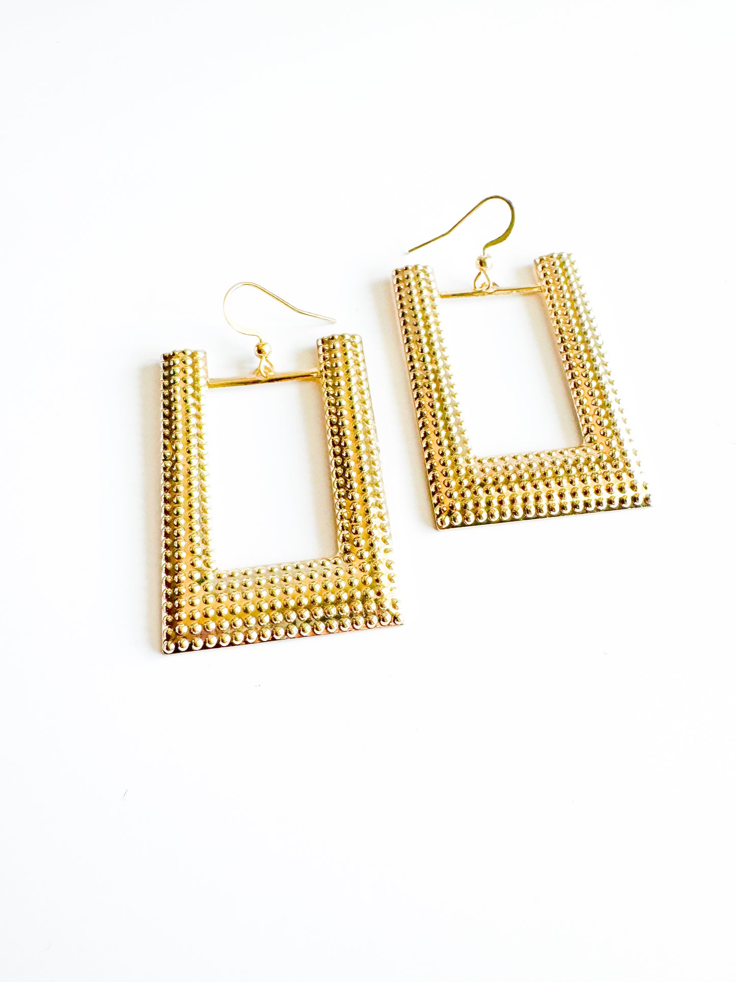large u-shaped earrings in gold