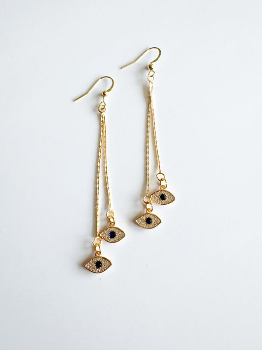 evil eye earrings in gold