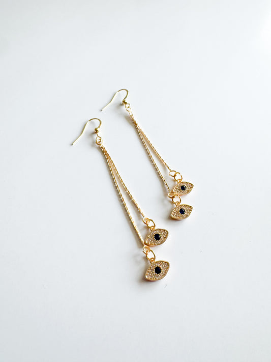 evil eye earrings in gold