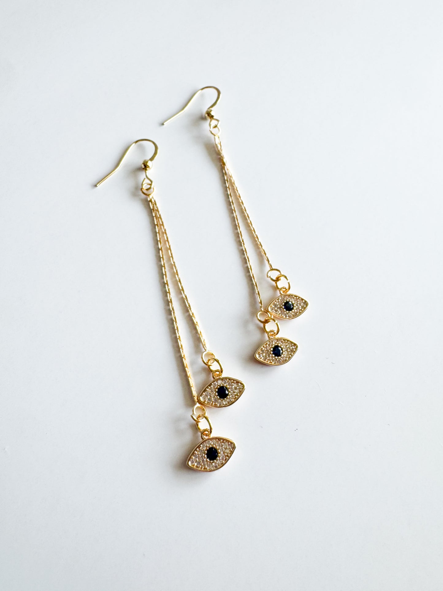 evil eye earrings in gold