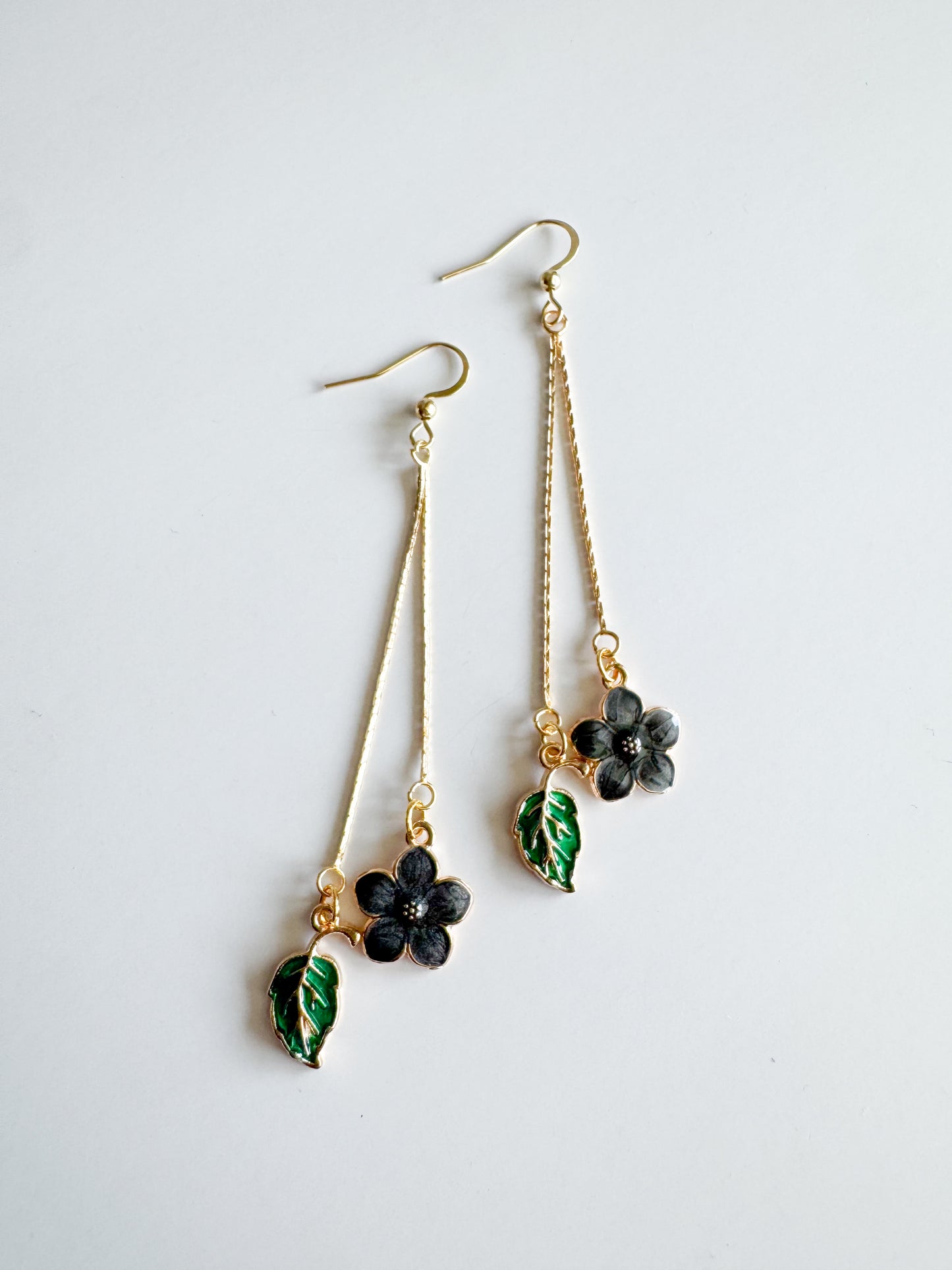 black flower & green leaf earrings