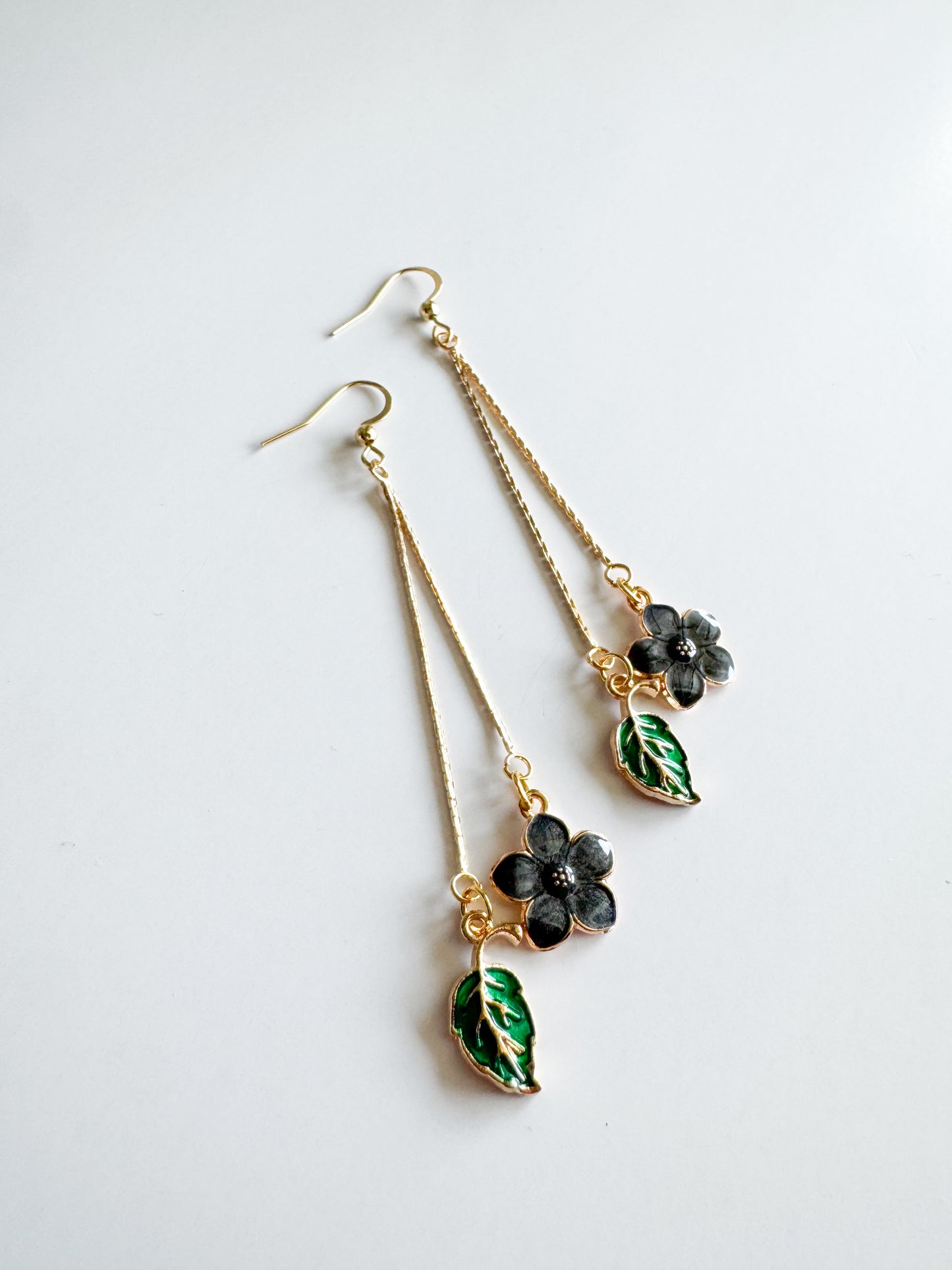 black flower & green leaf earrings
