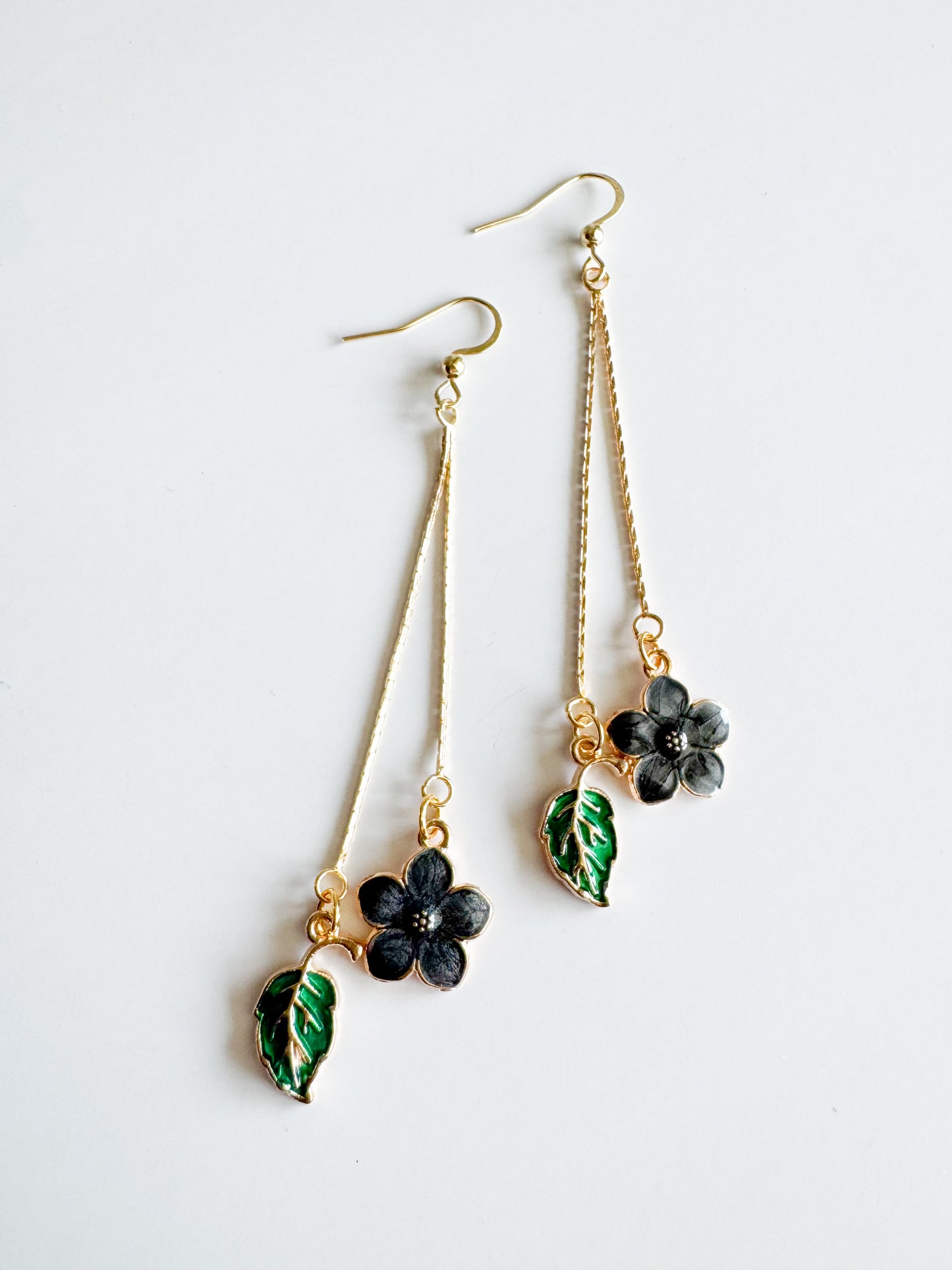 black flower & green leaf earrings