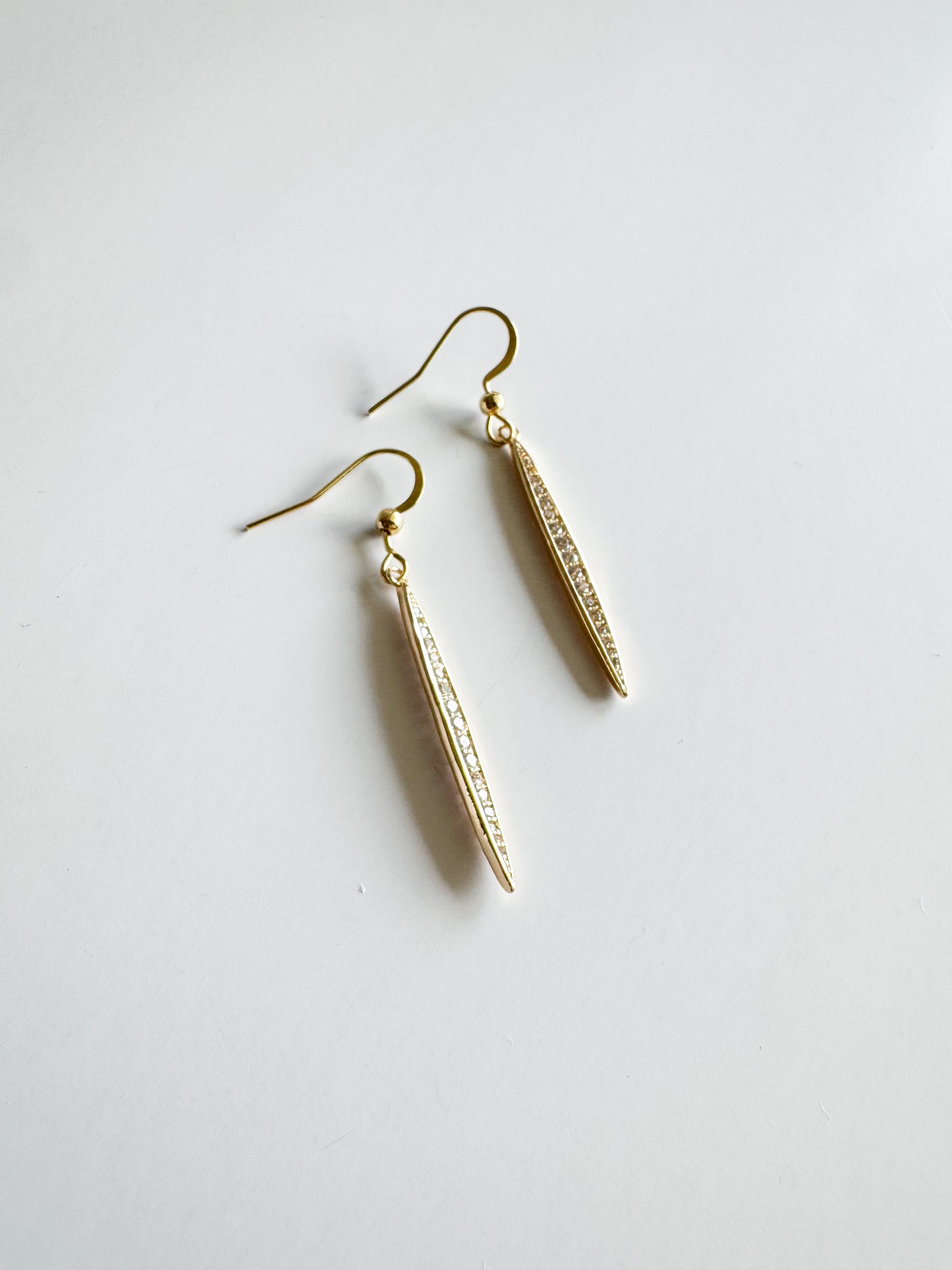 long oval stick pave earrings in gold