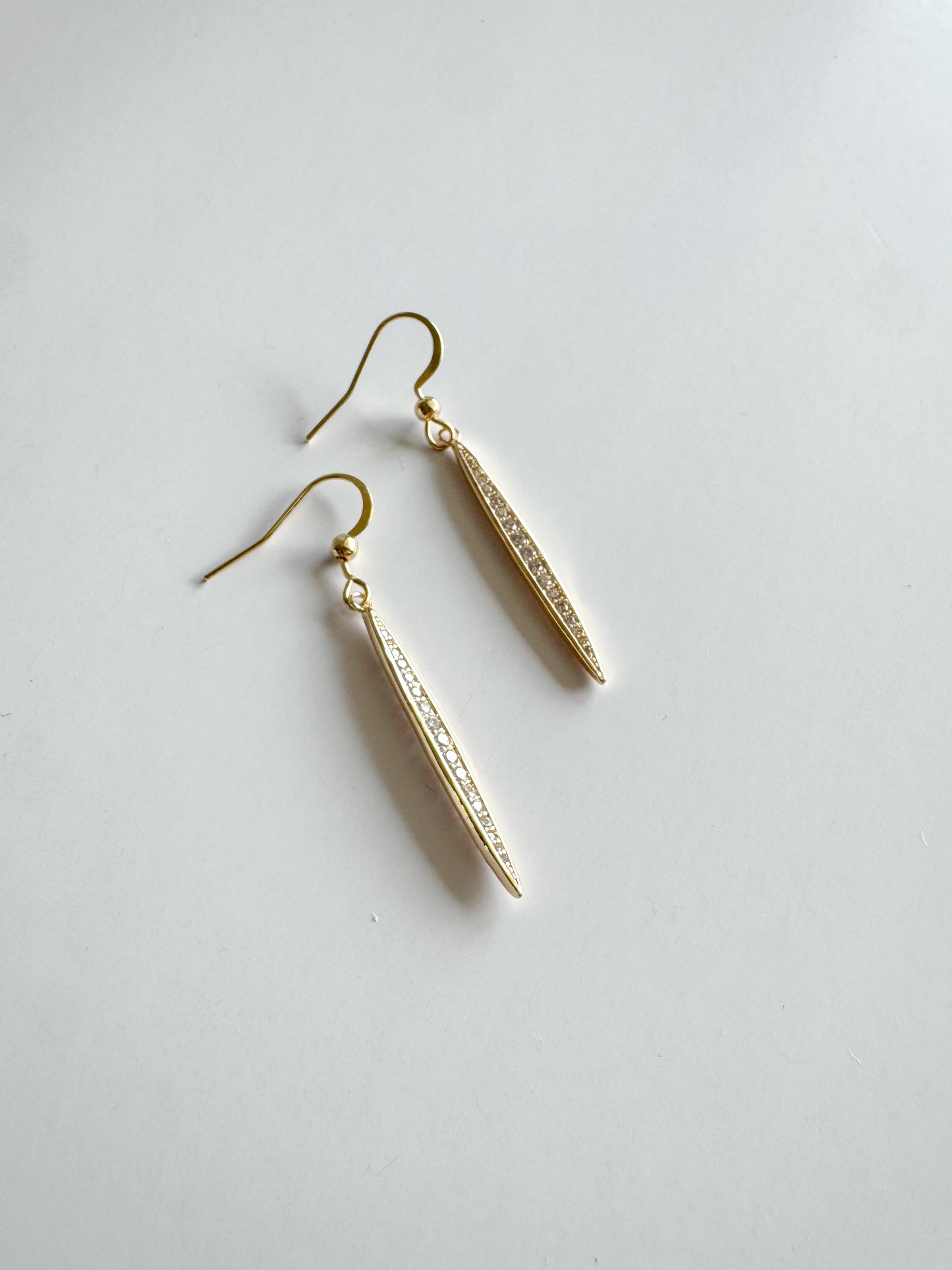 long oval stick pave earrings in gold