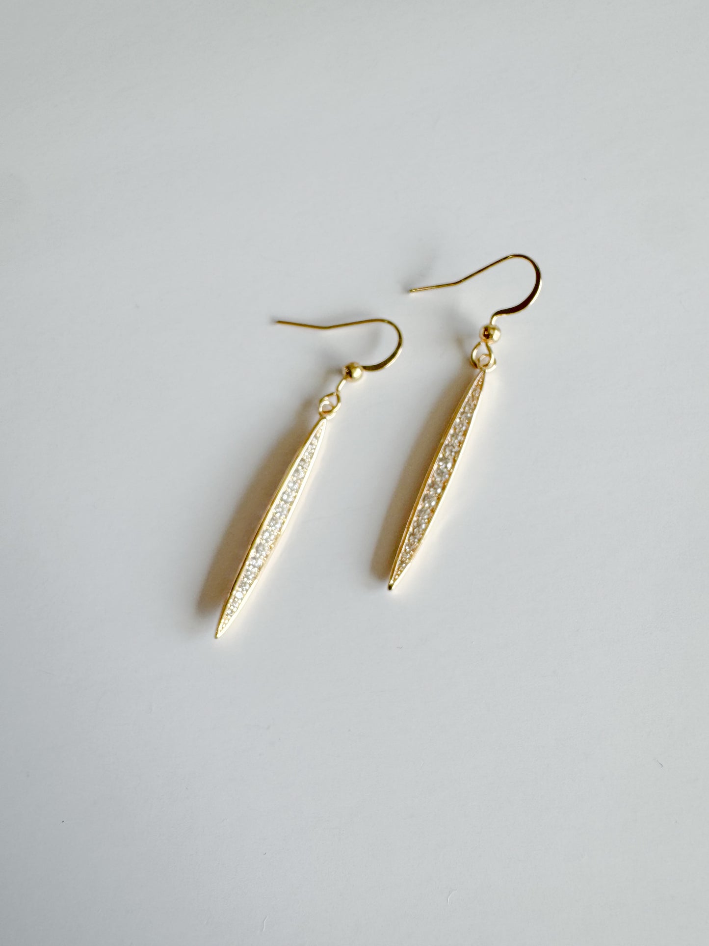 long oval stick pave earrings in gold