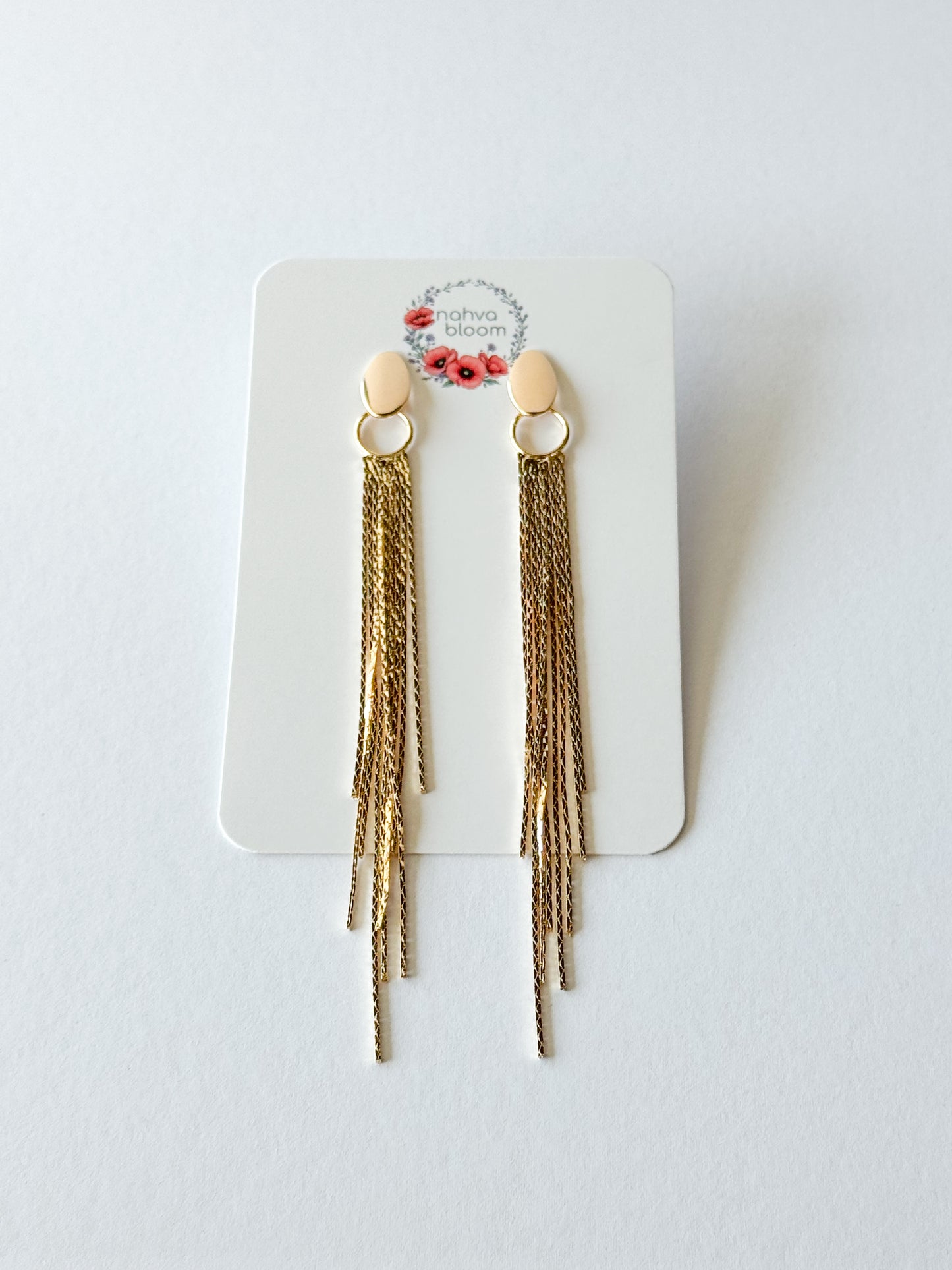 oval top tassel earrings in gold