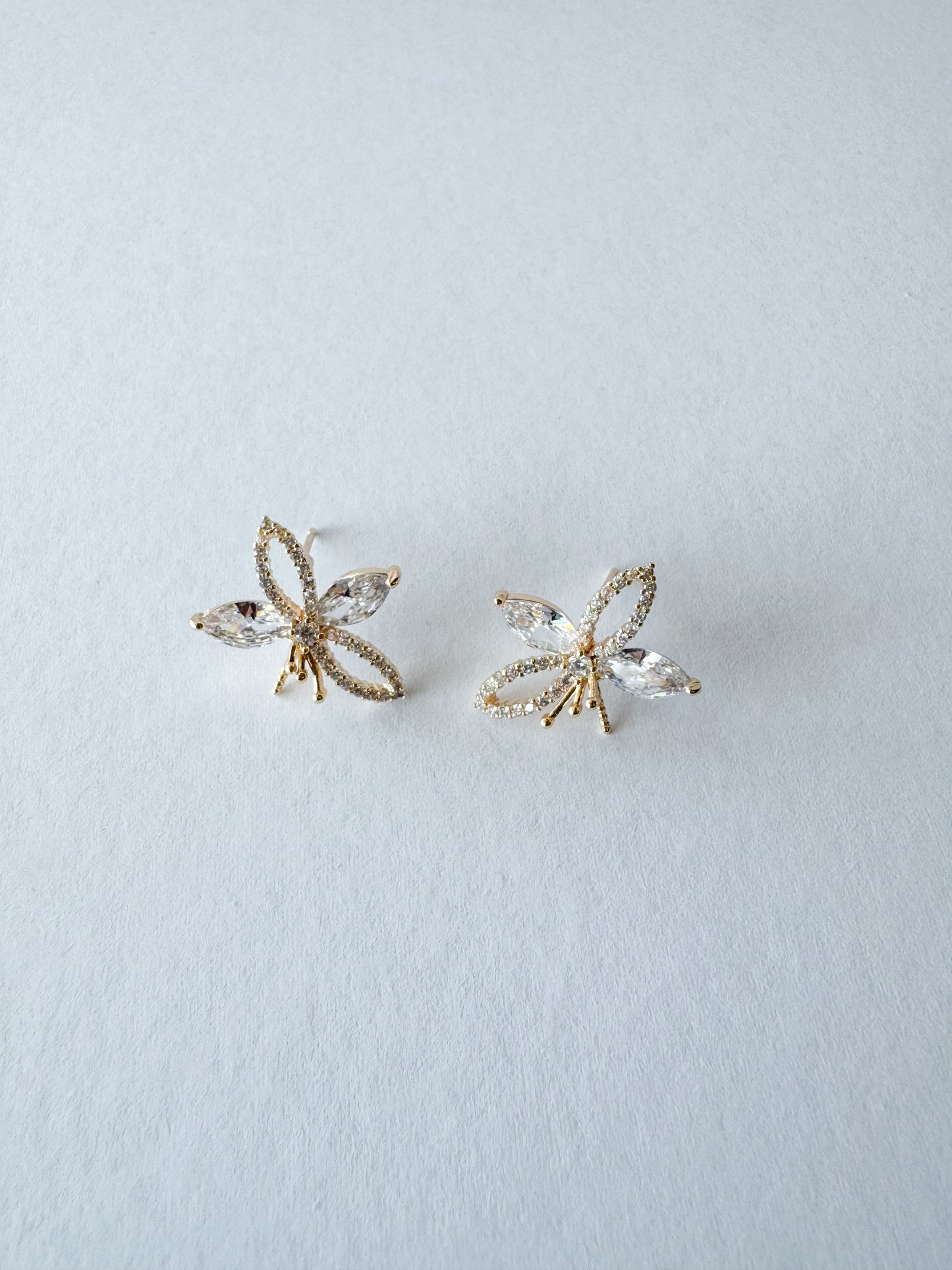 cz pave flower earrings in gold