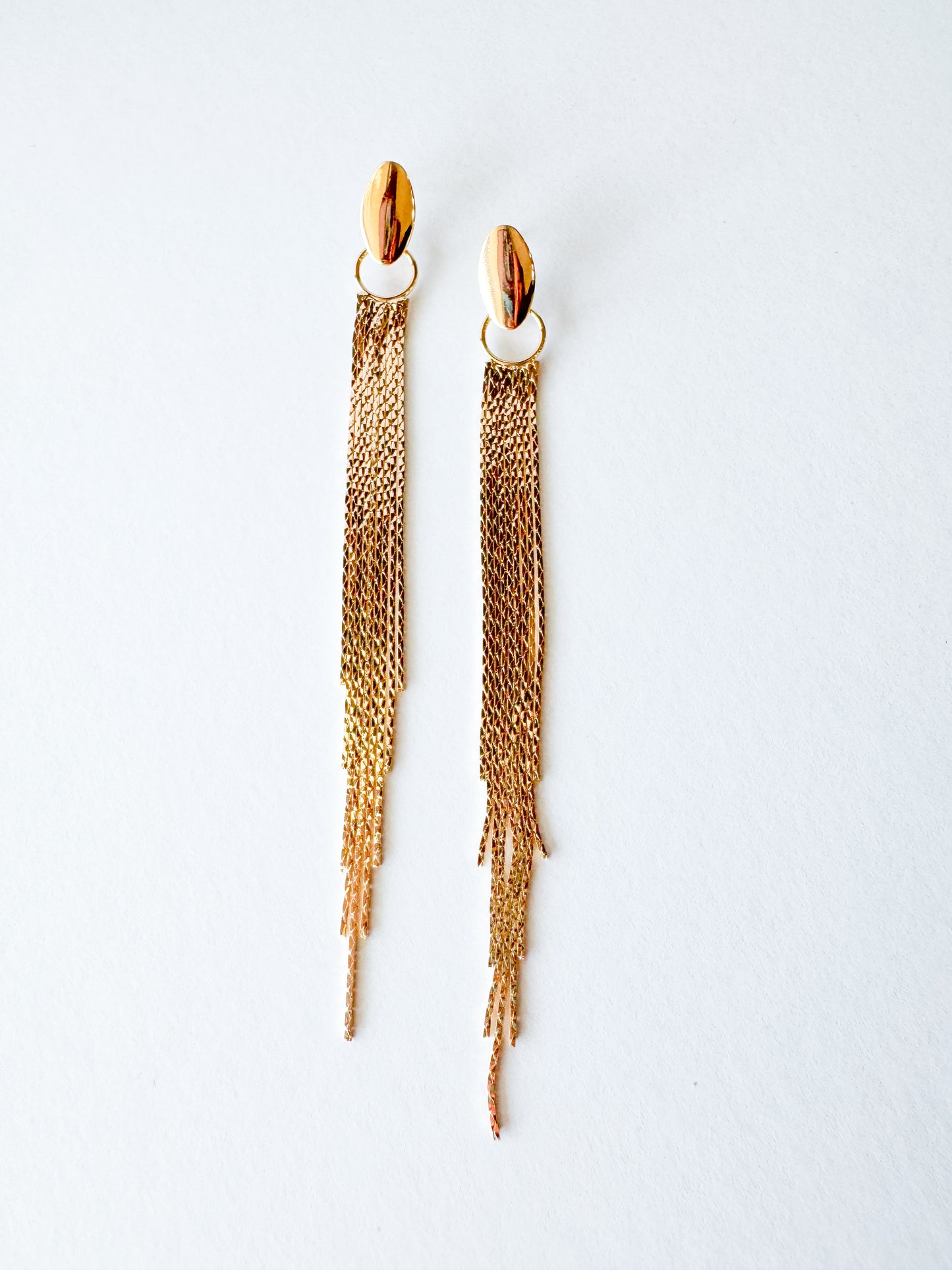oval top tassel earrings in gold