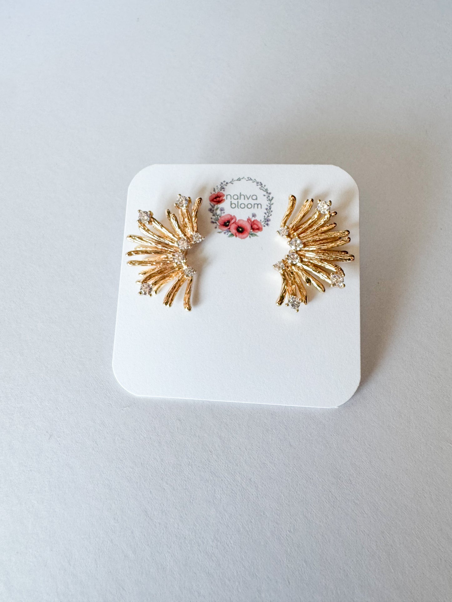 cz pave earrings in gold