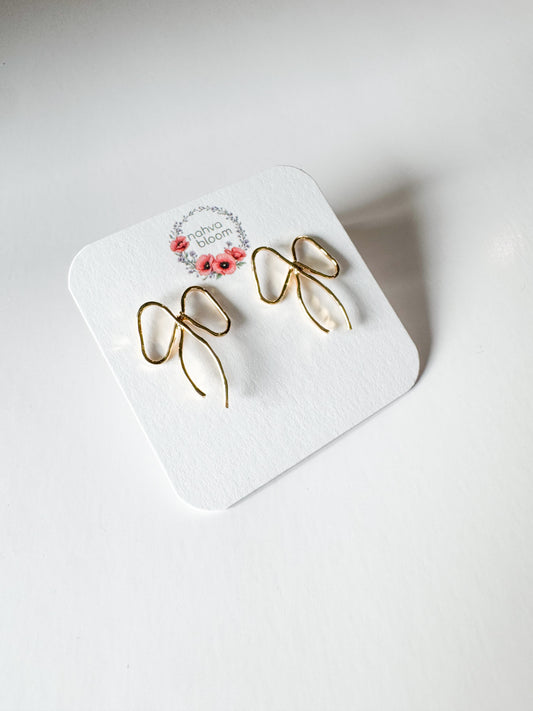 bow studs in gold