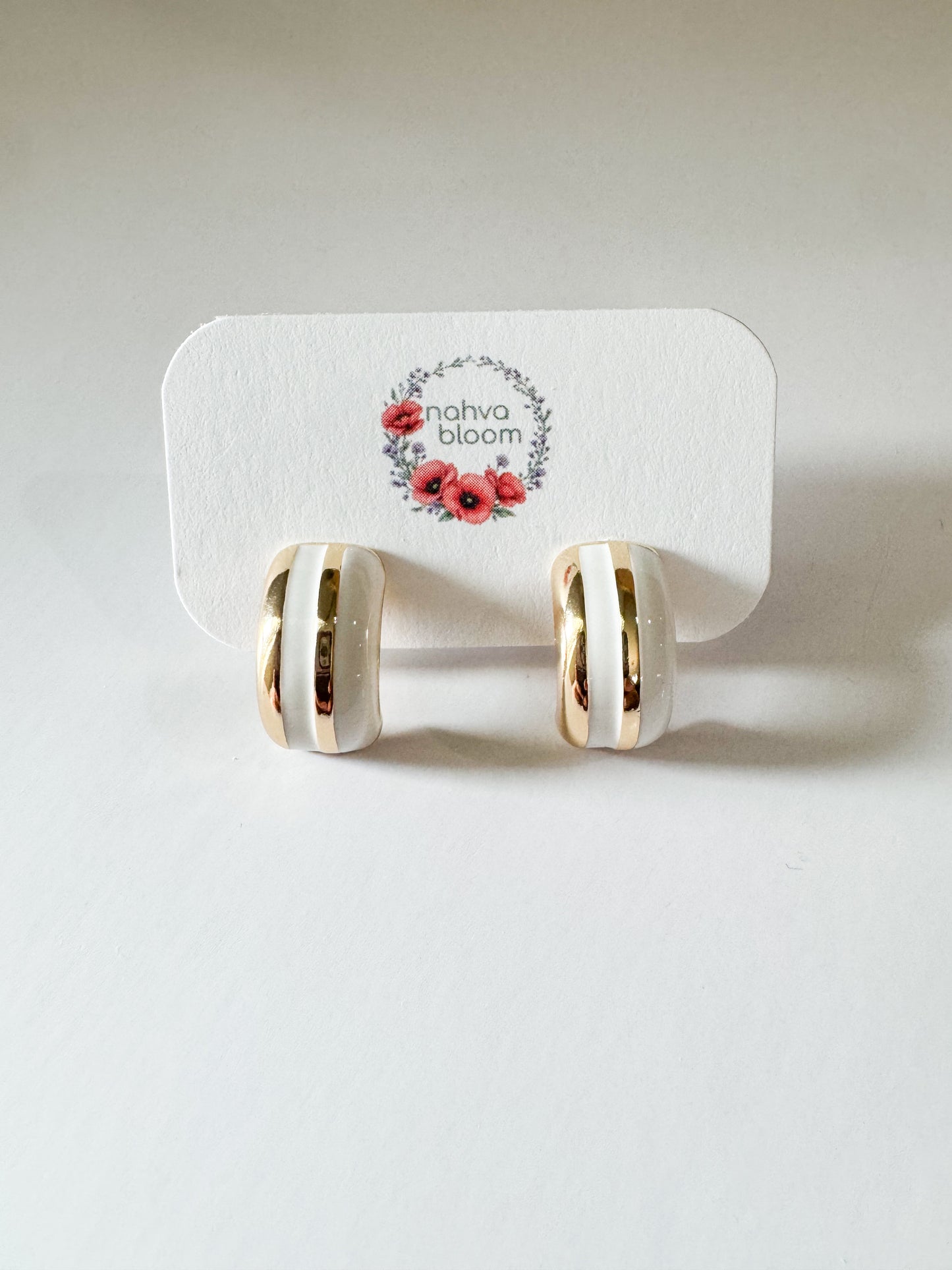 white enamel stud earrings