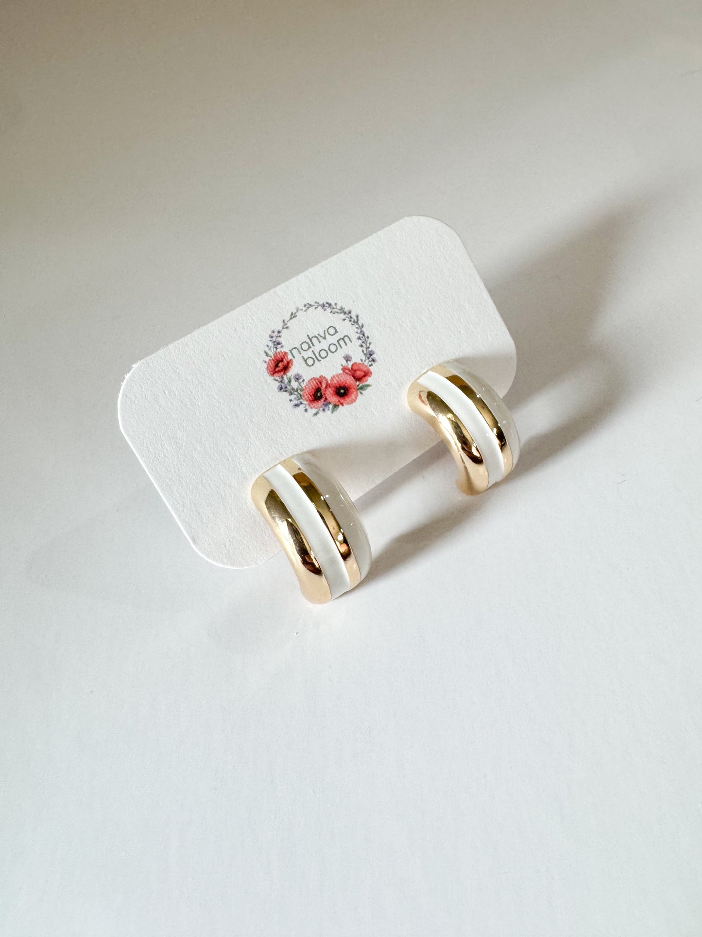white enamel stud earrings