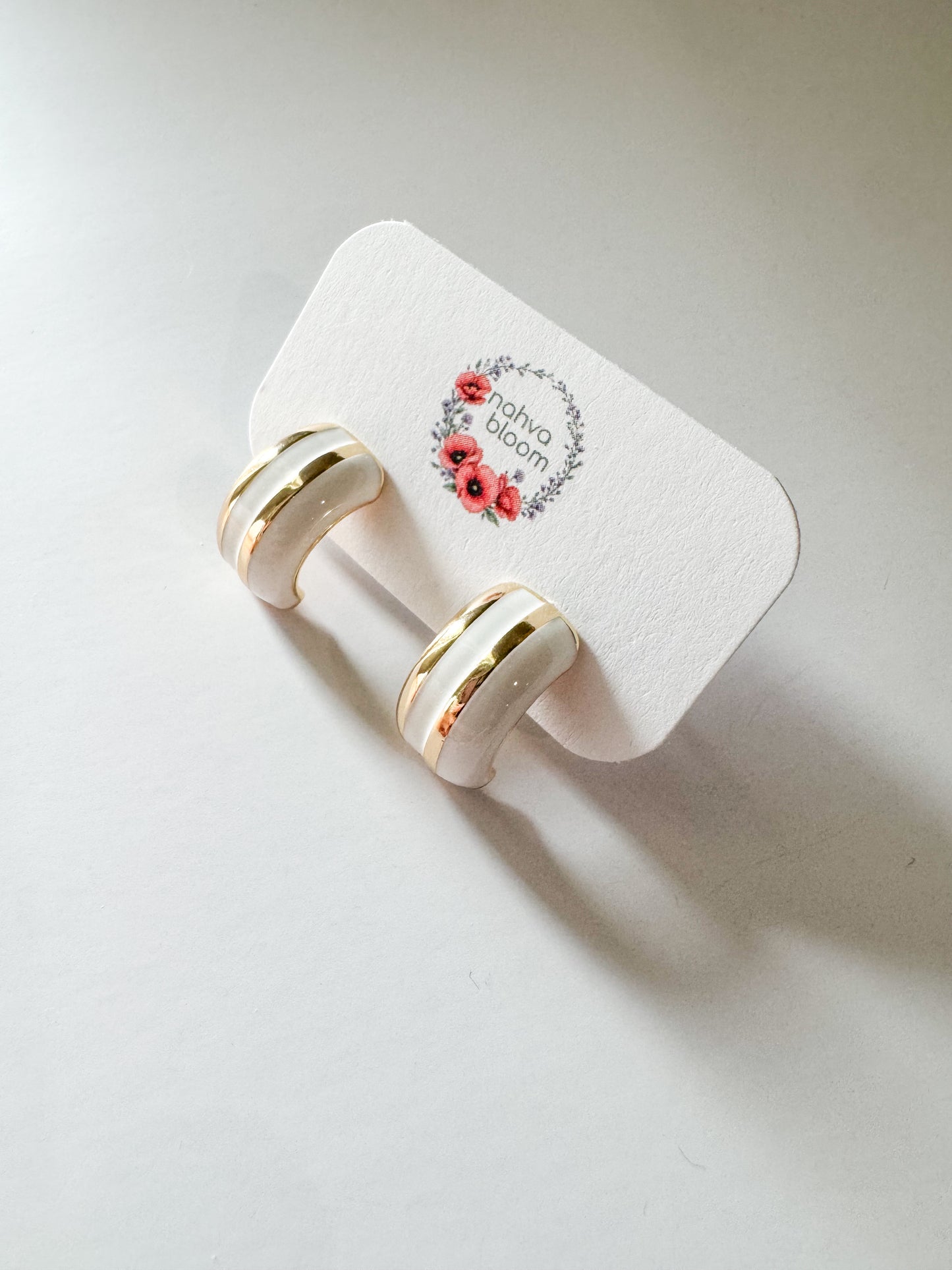 white enamel stud earrings