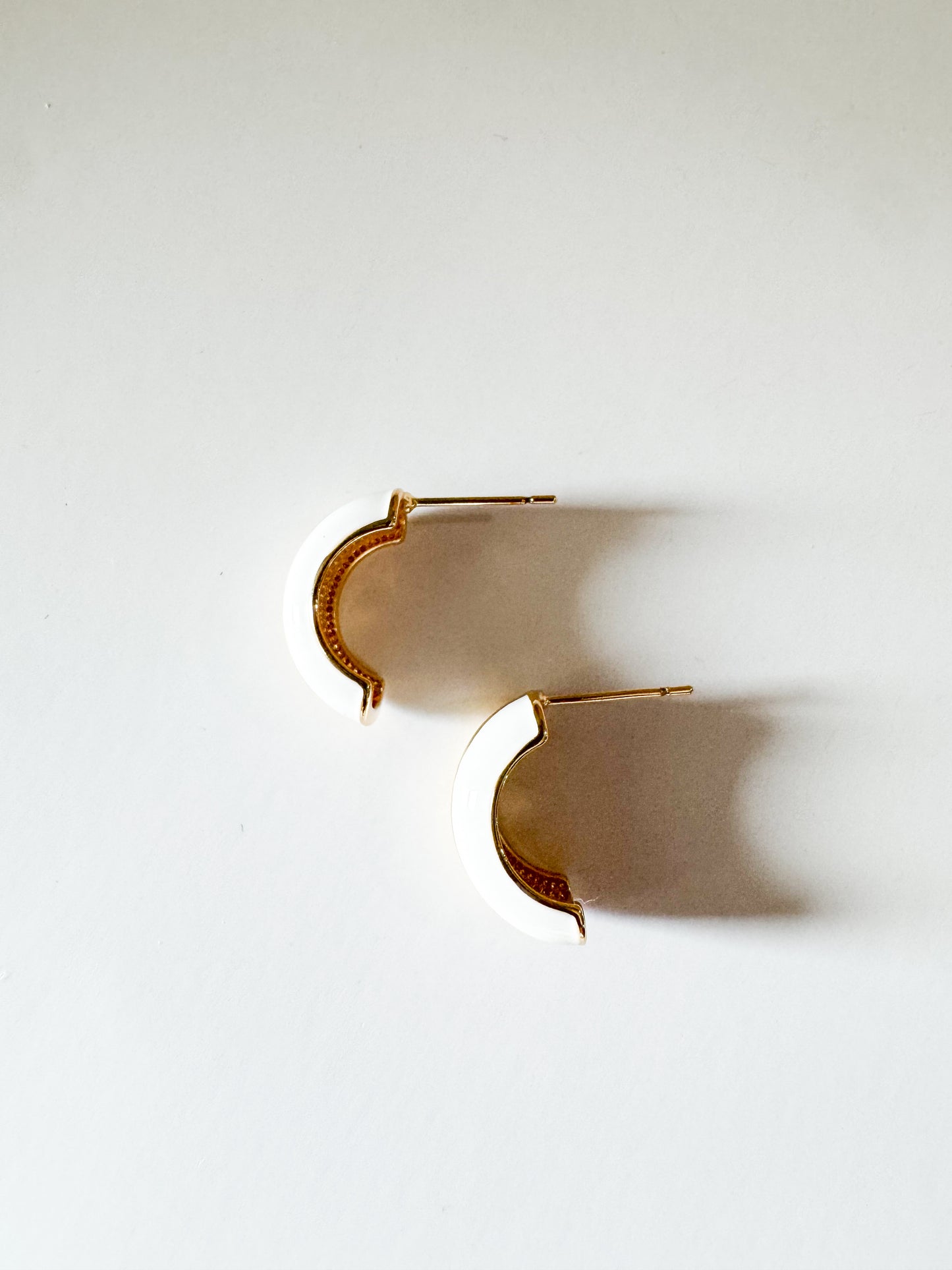 white enamel stud earrings