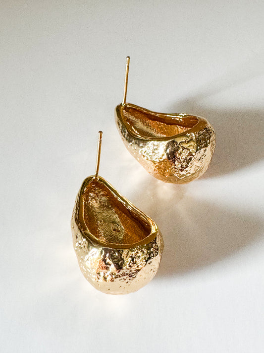 hammered teardrop studs in gold