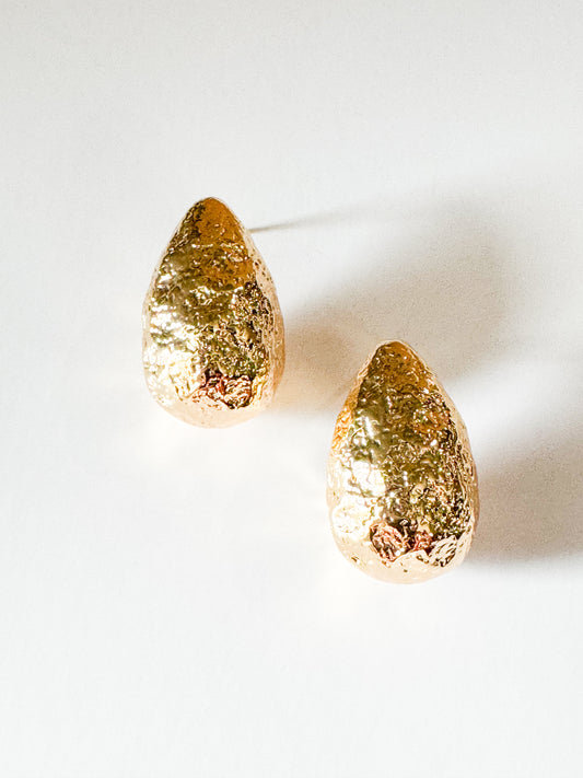 hammered teardrop studs in gold