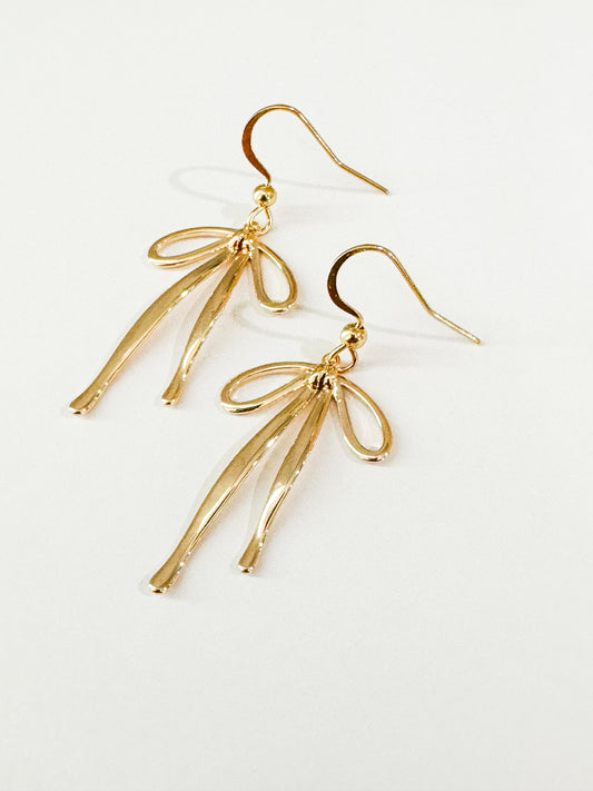 bow earrings in gold