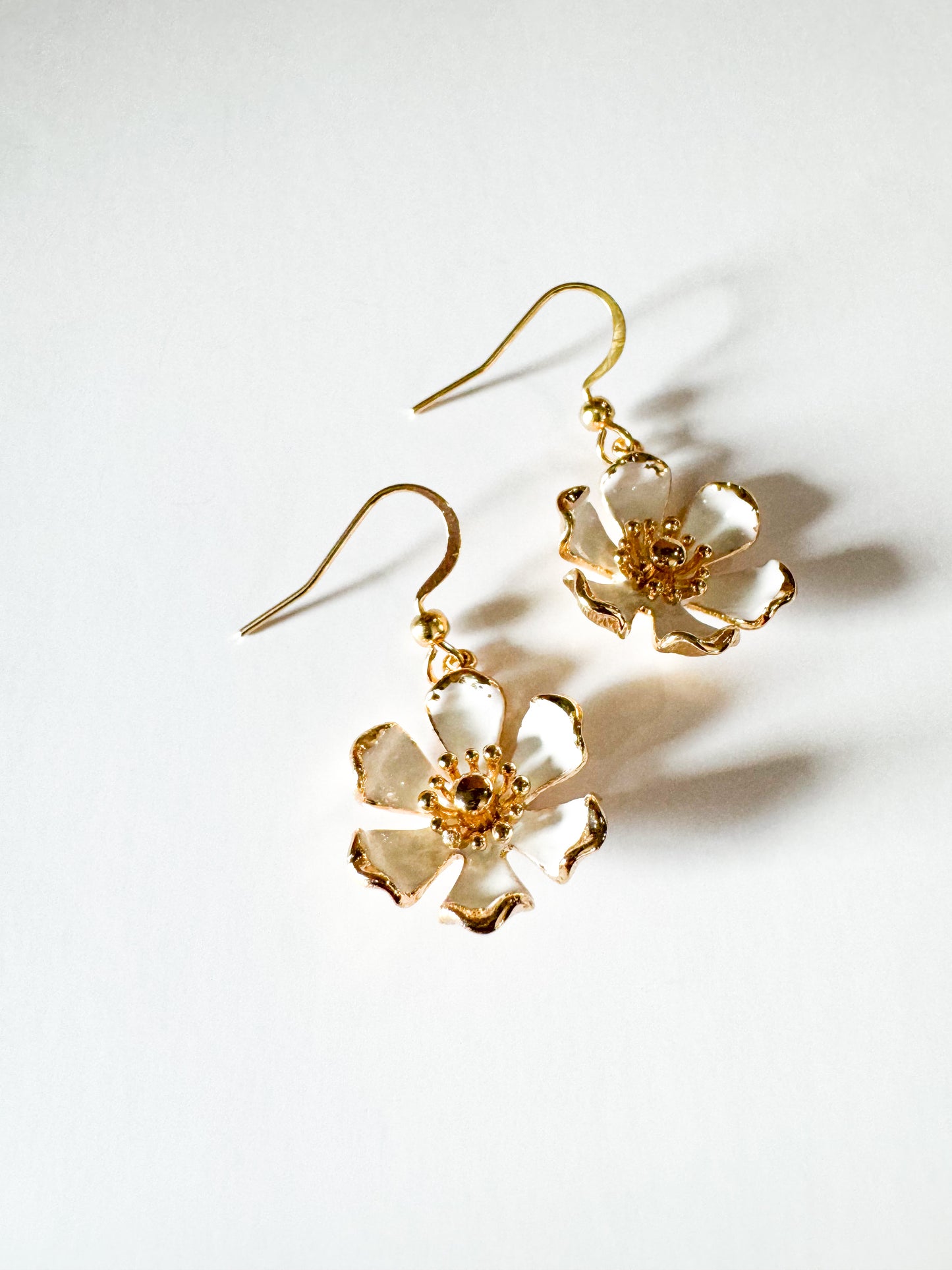 gold & white enamel flower earrings