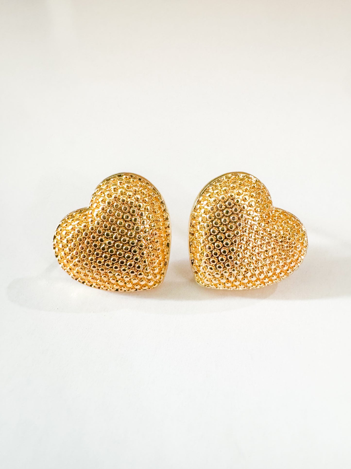 textured heart studs in gold