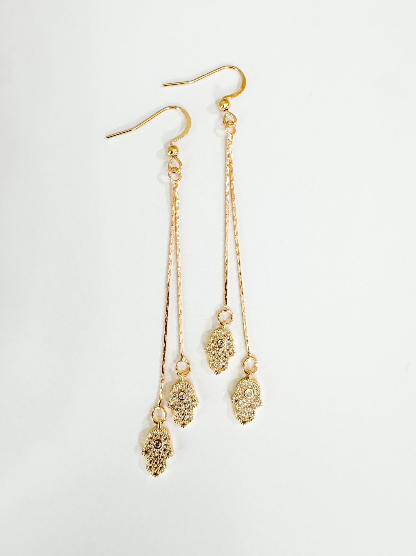hamsa hands earrings in gold